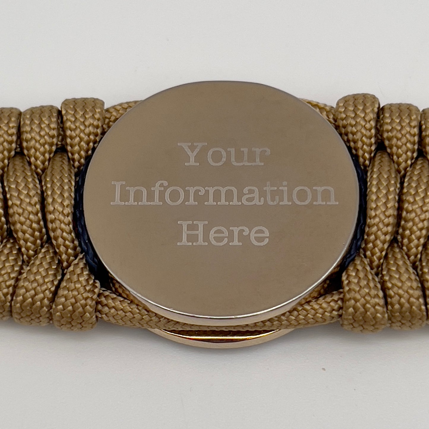 Thick and comfortable braided United States Marine Corps bracelet featuring a 24K gold and silver plated USMC officer Eagle Globe and Anchor medallion, a gold Cobra style tactical buckle and woven with gold 550 paracord and Imperial Red and Navy Blue micro cord.