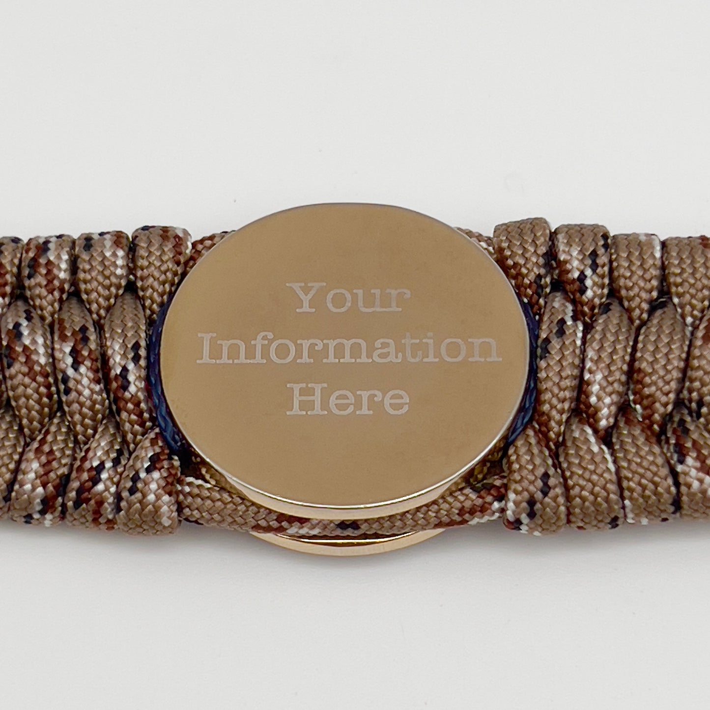Thick and comfortable braided United States Marine Corps bracelet featuring a 24K gold and silver plated USMC officer Eagle Globe and Anchor medallion, a gold Cobra style tactical buckle and woven with Desert Camo 550 paracord and Imperial Red and Navy Blue micro cord.