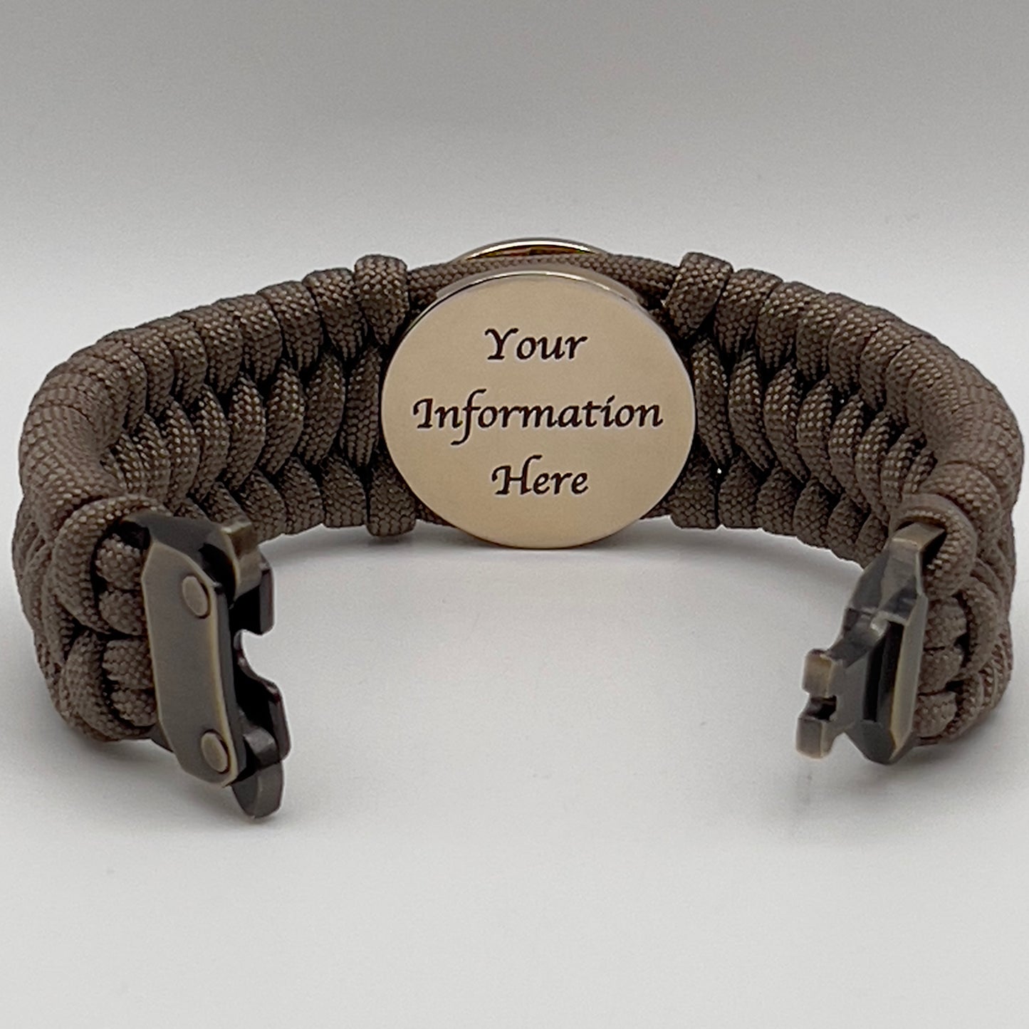 Thick, wide, semi-rigid and comfortable braided United States Marine Corps bracelet featuring a 24K gold plated USMC Eagle Globe and Anchor medallion, a gold Cobra style tactical buckle and woven with tan 550 paracord.