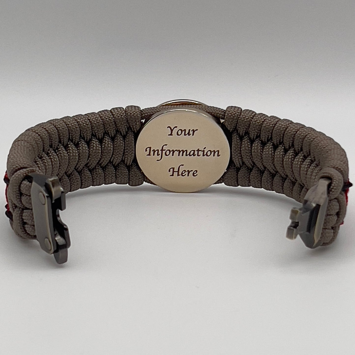 Thick, wide, rigid and comfortable handwoven United States Marine Corps bracelet featuring a 24K gold plated USMC Eagle Globe and Anchor medallion, a gold Cobra style tactical buckle and woven with tna 550 paracord, black micro cord and red nano cord.