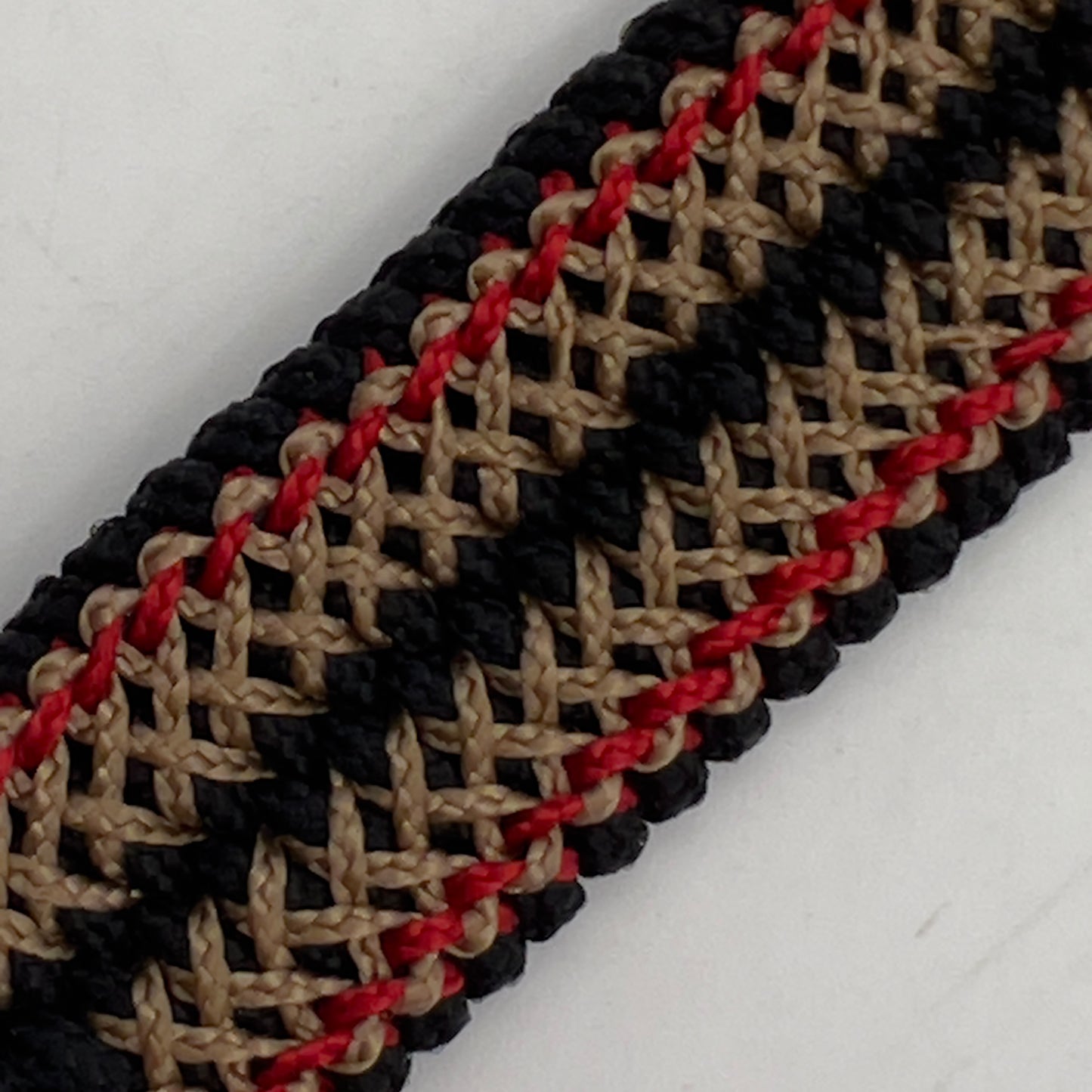 Thin, narrow, flexible and comfortable braided United States Marine Corps bracelet featuring a 24K gold plated USMC Eagle Globe and Anchor medallion, a black Cobra style tactical buckle and woven with black Type-1 paracord and Imperial Red and Gold nano cord.