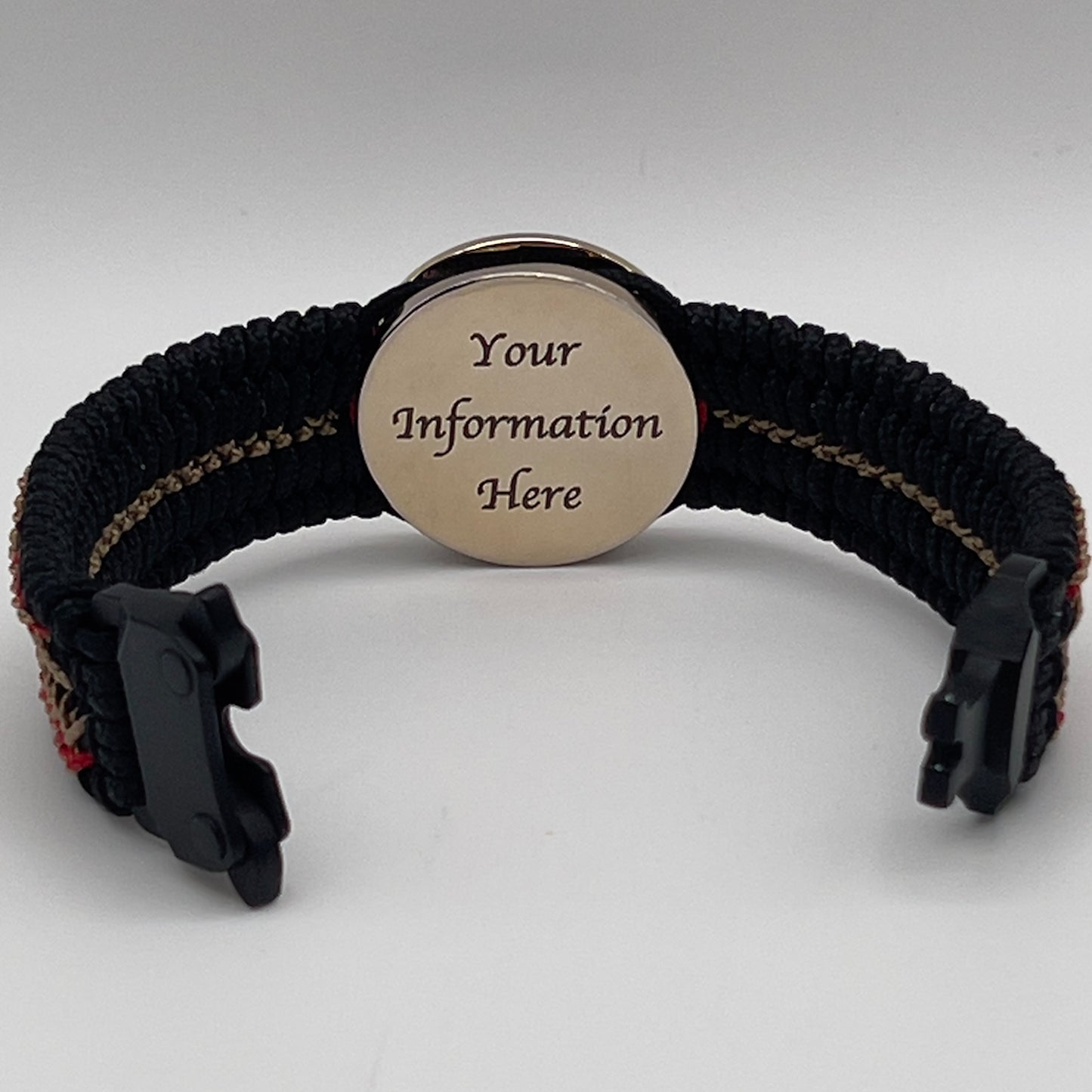 Thin, narrow, flexible and comfortable braided United States Marine Corps bracelet featuring a 24K gold plated USMC Eagle Globe and Anchor medallion, a black Cobra style tactical buckle and woven with black Type-1 paracord and Imperial Red and Gold nano cord.