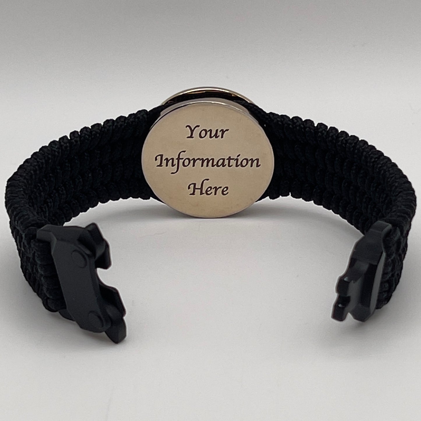 Thin, medium width, flexible and comfortable braided United States Marine Corps bracelet featuring a 24K gold plated USMC officer Eagle Globe and Anchor medallion, a black Cobra style tactical buckle and woven with black Type-1 paracord.