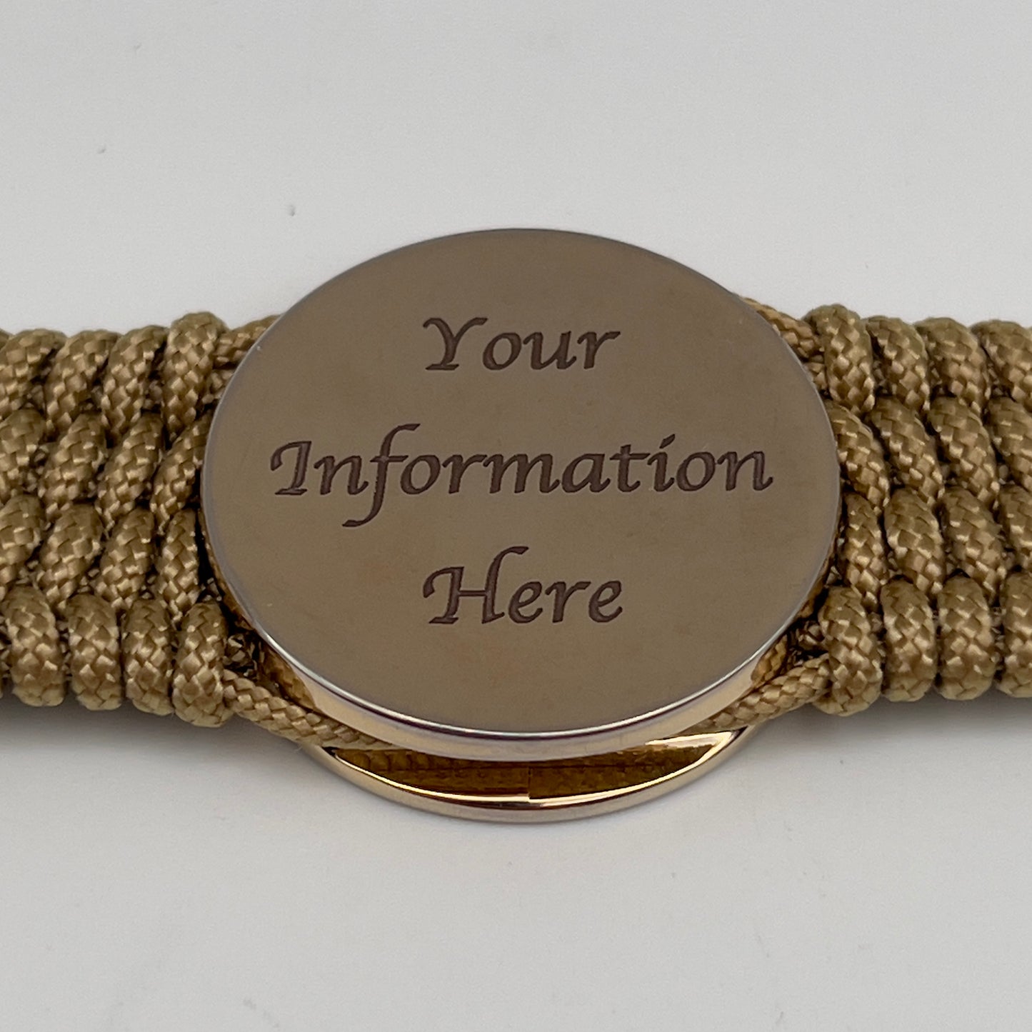 Thin, medium width, flexible and comfortable braided United States Marine Corps bracelet featuring a 24K gold plated USMC officer Eagle Globe and Anchor medallion, a gold Cobra style tactical buckle and woven with gold Type-1 paracord.