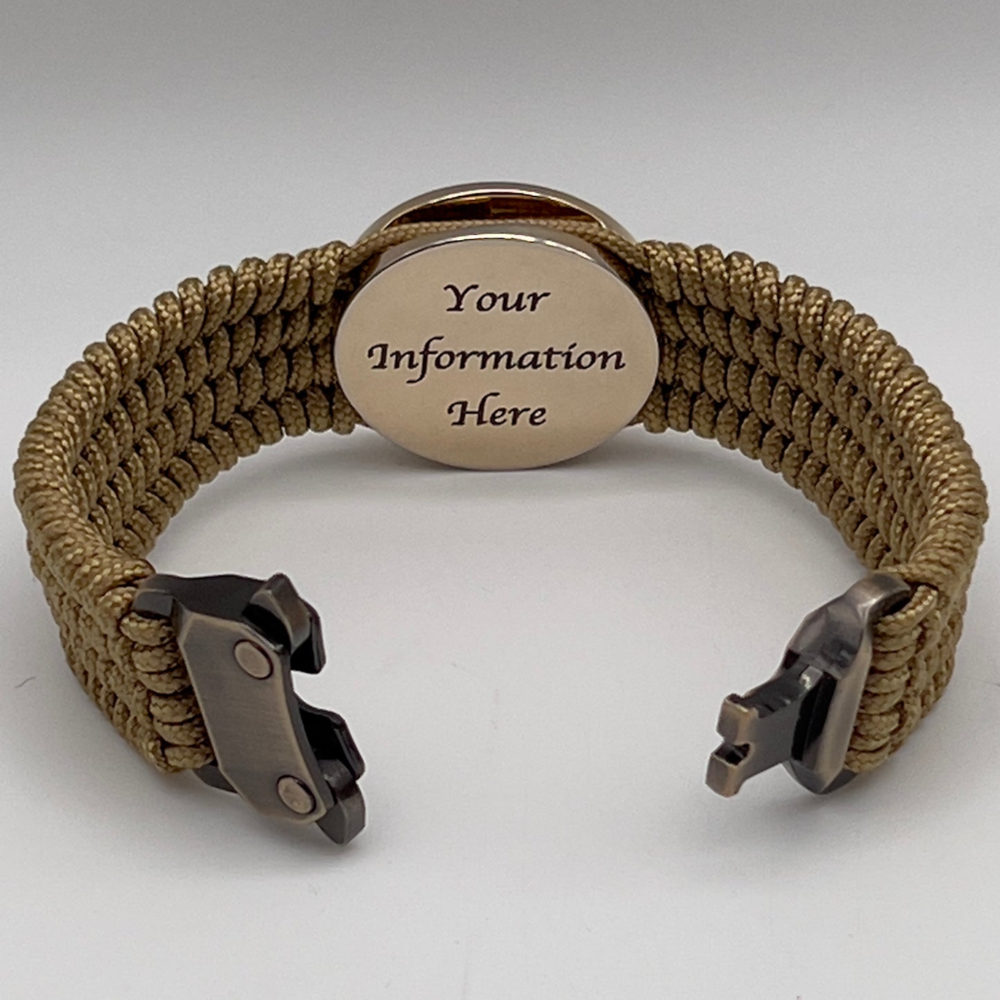 Thin, medium width, flexible and comfortable braided United States Marine Corps bracelet featuring a 24K gold plated USMC officer Eagle Globe and Anchor medallion, a gold Cobra style tactical buckle and woven with gold Type-1 paracord.