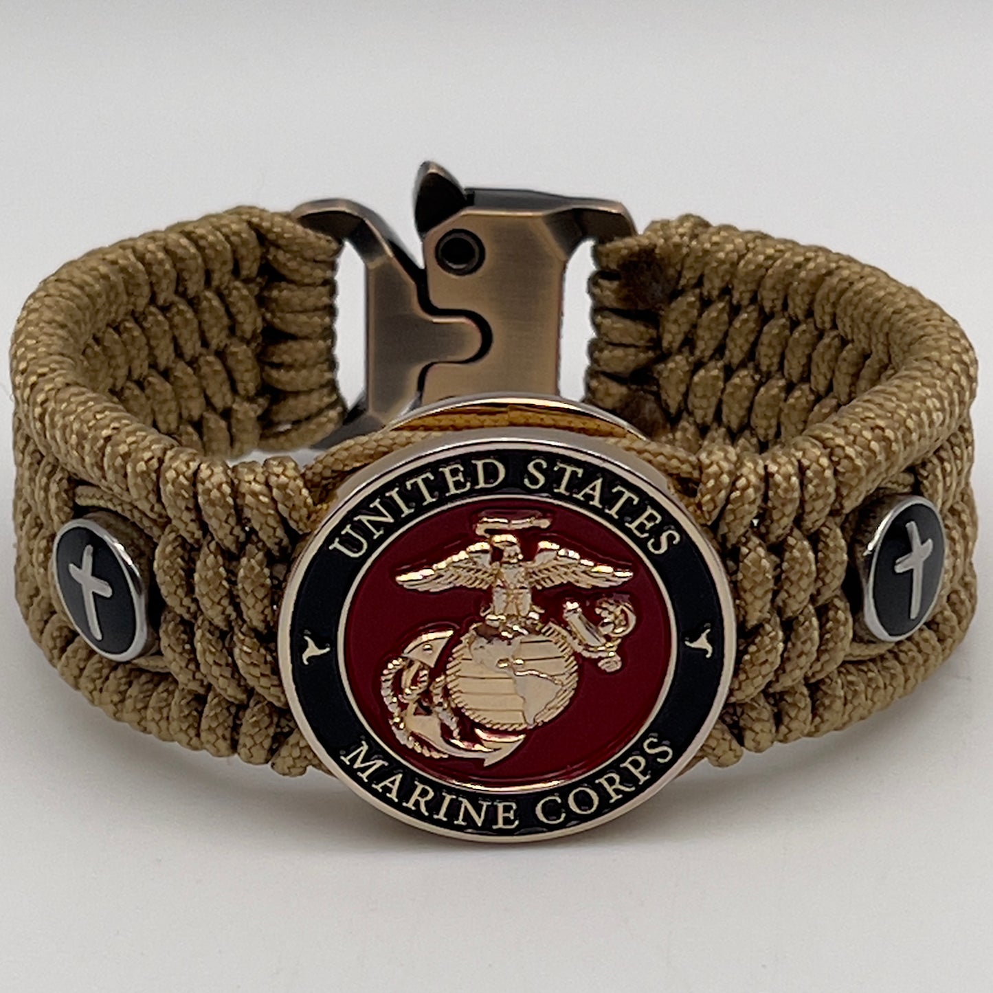 Thin, medium width, flexible and comfortable braided United States Marine Corps bracelet featuring a 24K gold plated USMC officer Eagle Globe and Anchor medallion, two Christian crosses, a gold Cobra style tactical buckle and woven with gold Type-1 paracord.