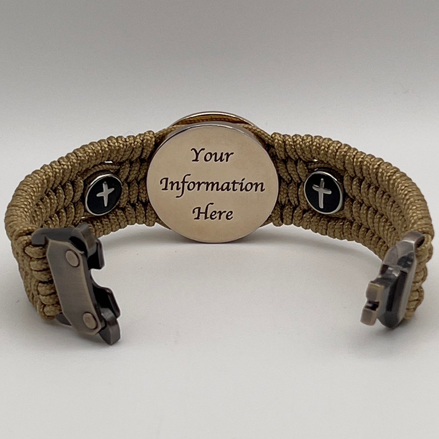Thin, medium width, flexible and comfortable braided United States Marine Corps bracelet featuring a 24K gold plated USMC officer Eagle Globe and Anchor medallion, two Christian crosses, a gold Cobra style tactical buckle and woven with gold Type-1 paracord.
