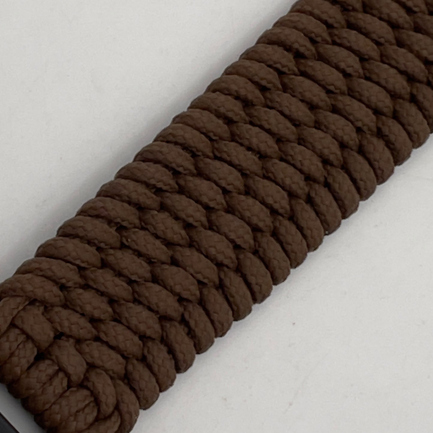 Thin, medium width, flexible and comfortable braided United States Marine Corps bracelet featuring a 24K gold plated USMC officer Eagle Globe and Anchor medallion, a gold Cobra style tactical buckle and woven with Coyote Brown Type-1 paracord.