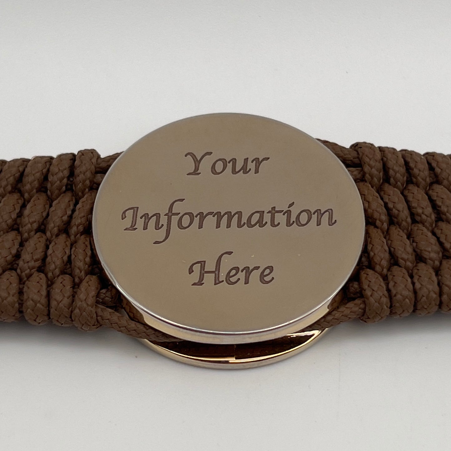 Thin, medium width, flexible and comfortable braided United States Marine Corps bracelet featuring a 24K gold plated USMC officer Eagle Globe and Anchor medallion, a gold Cobra style tactical buckle and woven with Coyote Brown Type-1 paracord.