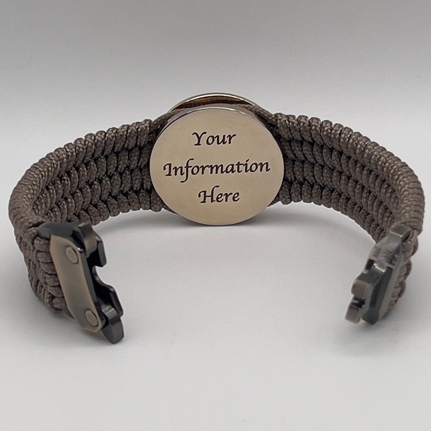 Thin, medium width, flexible and comfortable braided United States Marine Corps bracelet featuring a 24K gold plated USMC officer Eagle Globe and Anchor medallion, a gold Cobra style tactical buckle and woven with Tan Type-1 paracord.
