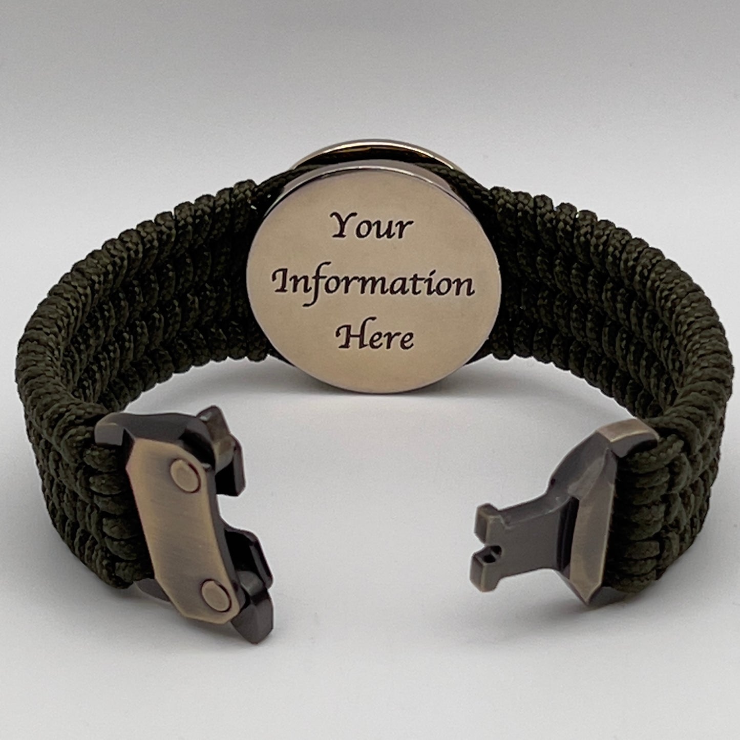 Thin, medium width, flexible and comfortable braided United States Marine Corps bracelet featuring a 24K gold plated USMC officer Eagle Globe and Anchor medallion, a gold Cobra style tactical buckle and woven with Olive Drab Type-1 paracord.