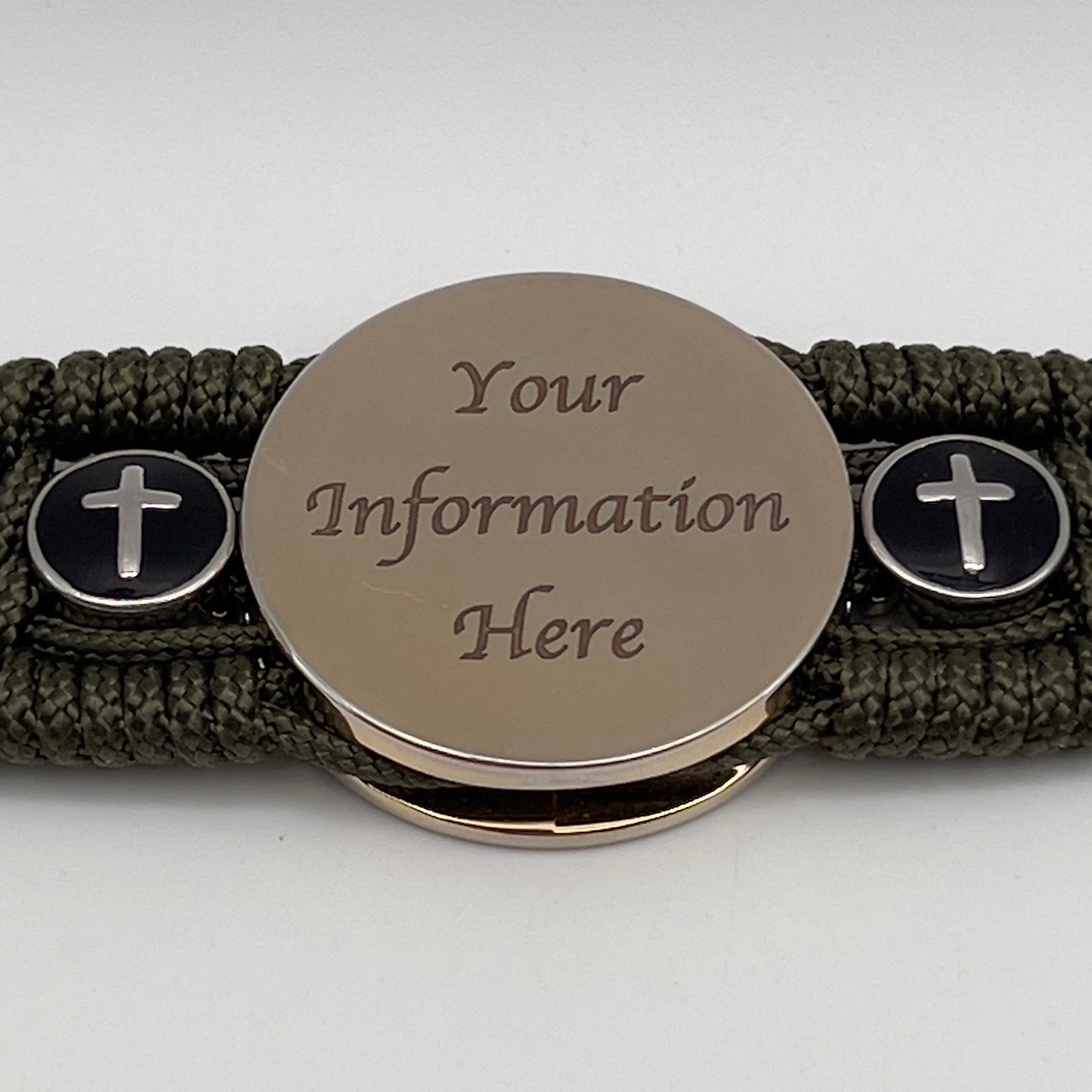 Thin, medium width, flexible and comfortable braided United States Marine Corps bracelet featuring a 24K gold plated USMC officer Eagle Globe and Anchor medallion, two Christian crosses, a black Cobra style tactical buckle and woven with Olive Drab Type-1 paracord.