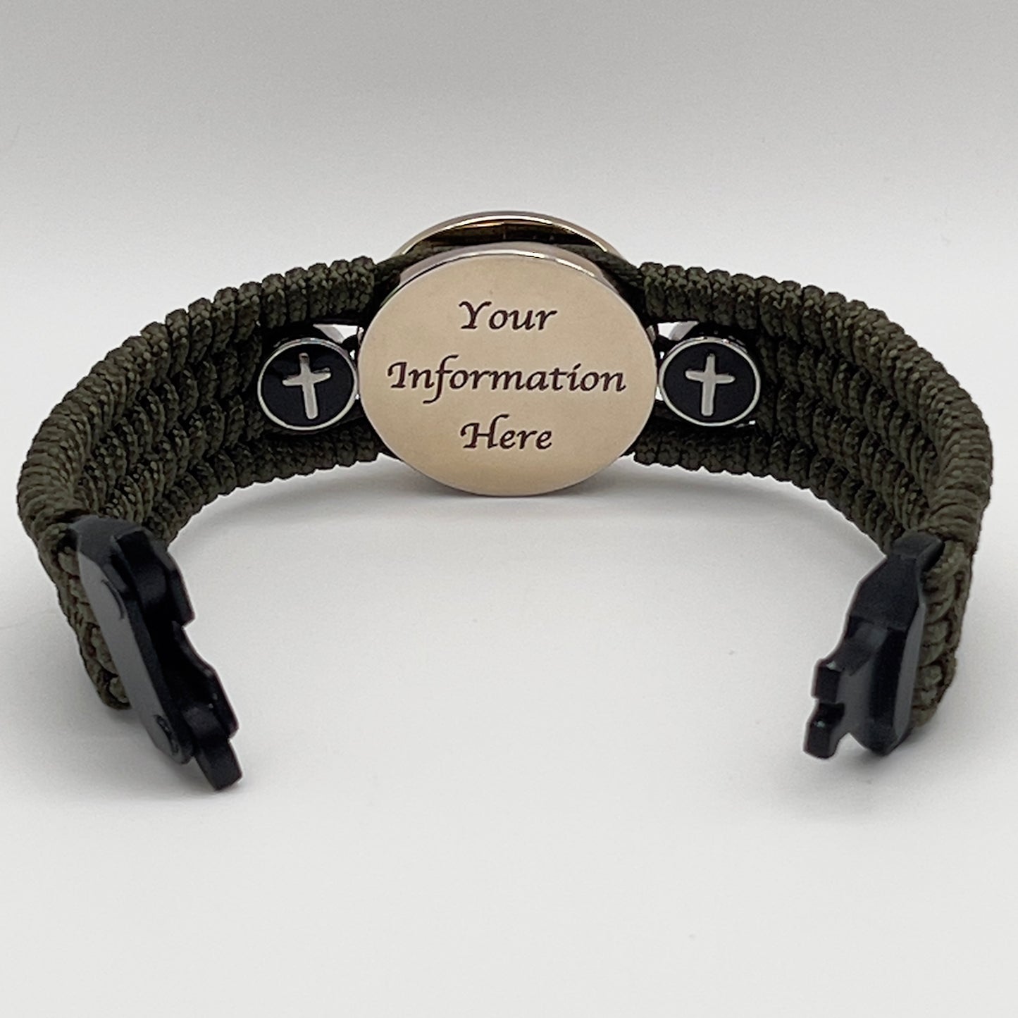 Thin, medium width, flexible and comfortable braided United States Marine Corps bracelet featuring a 24K gold plated USMC officer Eagle Globe and Anchor medallion, two Christian crosses, a black Cobra style tactical buckle and woven with Olive Drab Type-1 paracord.