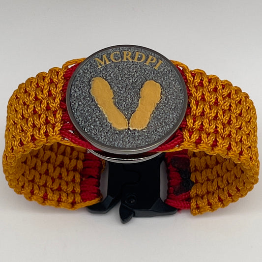 Thin, narrow, flexible and comfortable braided United States Marine Corps Recruit Depot Yellow Footprints bracelet featuring a black nickel plated UV enamel painted medallion replica of an actual set of USMC footprints, a black Cobra style tactical buckle and woven with Imperial Red type-1 paracord and Goldenrod micro cord.
