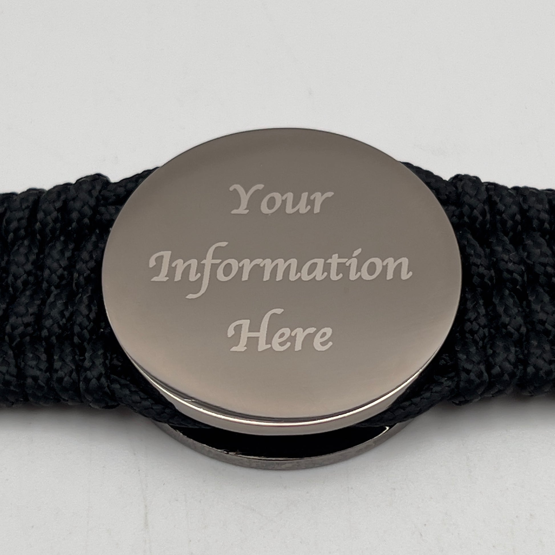 Thin, wide, flexible and comfortable braided United States Marine Corps Recruit Depot Yellow Footprints bracelet featuring a black nickel plated UV enamel painted medallion replica of an actual set of USMC footprints, a black Cobra style tactical buckle and woven with black Type-1 paracord.