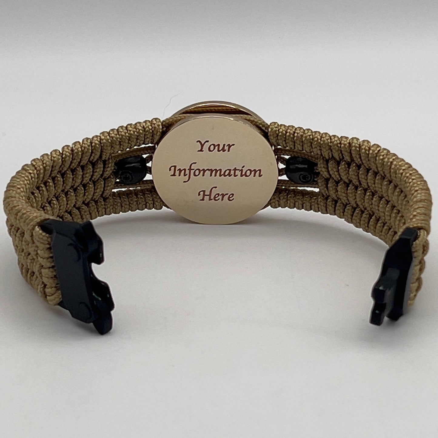 Thin, medium width, flexible and comfortable braided United States Marine Corps bracelet featuring a 24K gold and silver plated USMC officer Eagle Globe and Anchor medallion, two black micro skulls, a black Cobra style tactical buckle and woven with gold type-1 paracord.