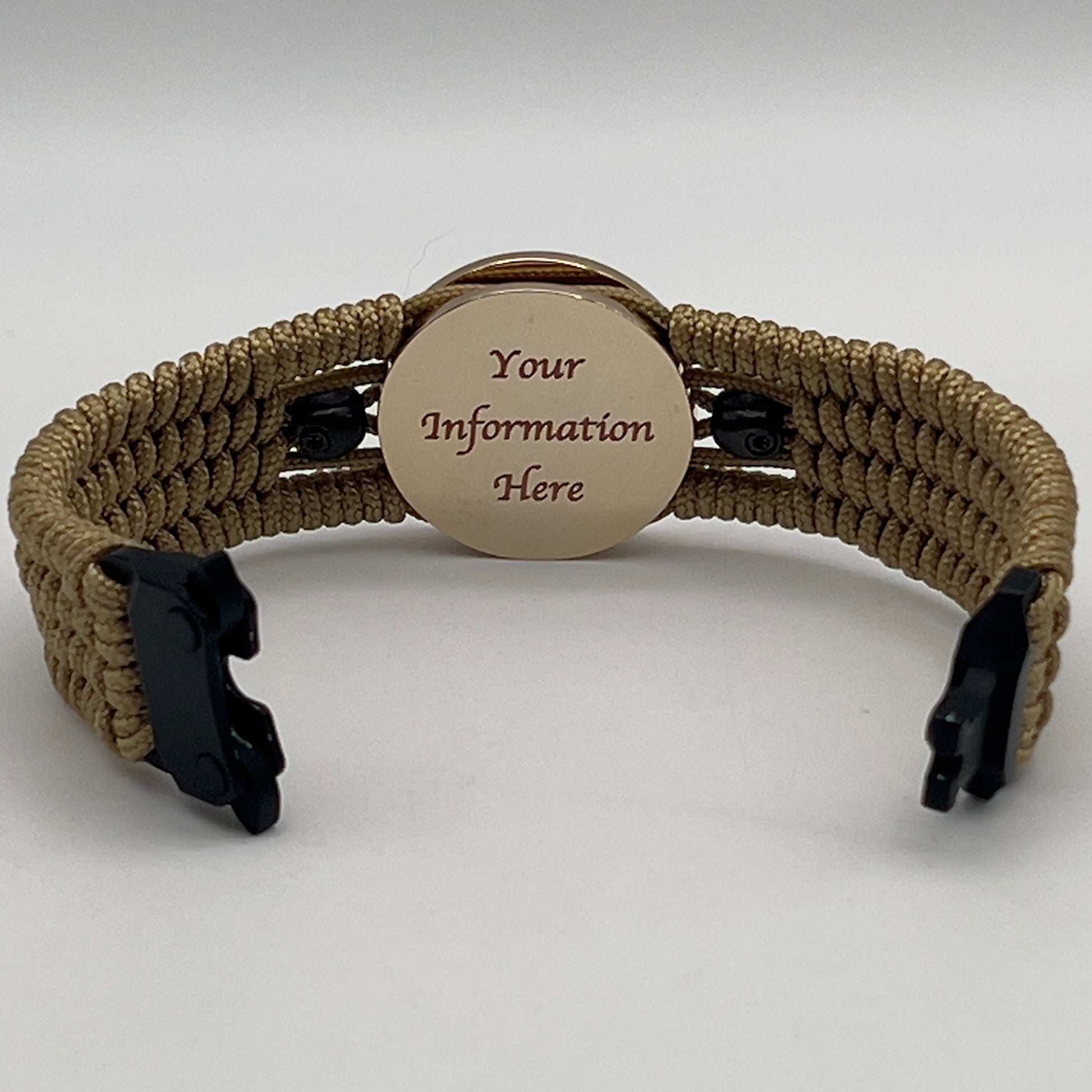 Thin, medium width, flexible and comfortable braided United States Marine Corps bracelet featuring a 24K gold and silver plated USMC officer Eagle Globe and Anchor medallion, two black micro skulls, a black Cobra style tactical buckle and woven with gold type-1 paracord.