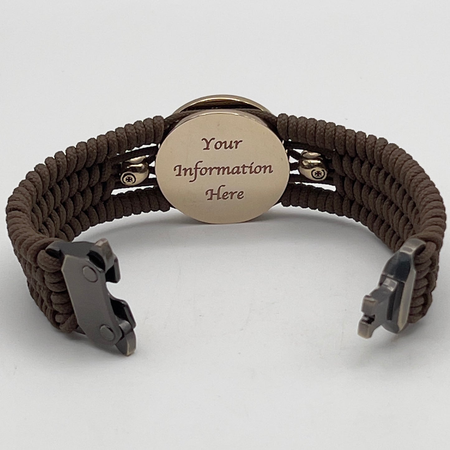Thin, medium width, flexible and comfortable braided United States Marine Corps bracelet featuring a 24K gold and silver plated USMC officer Eagle Globe and Anchor medallion, two gold micro skulls, a gold Cobra style tactical buckle and woven with Coyote Brown type-1 paracord.