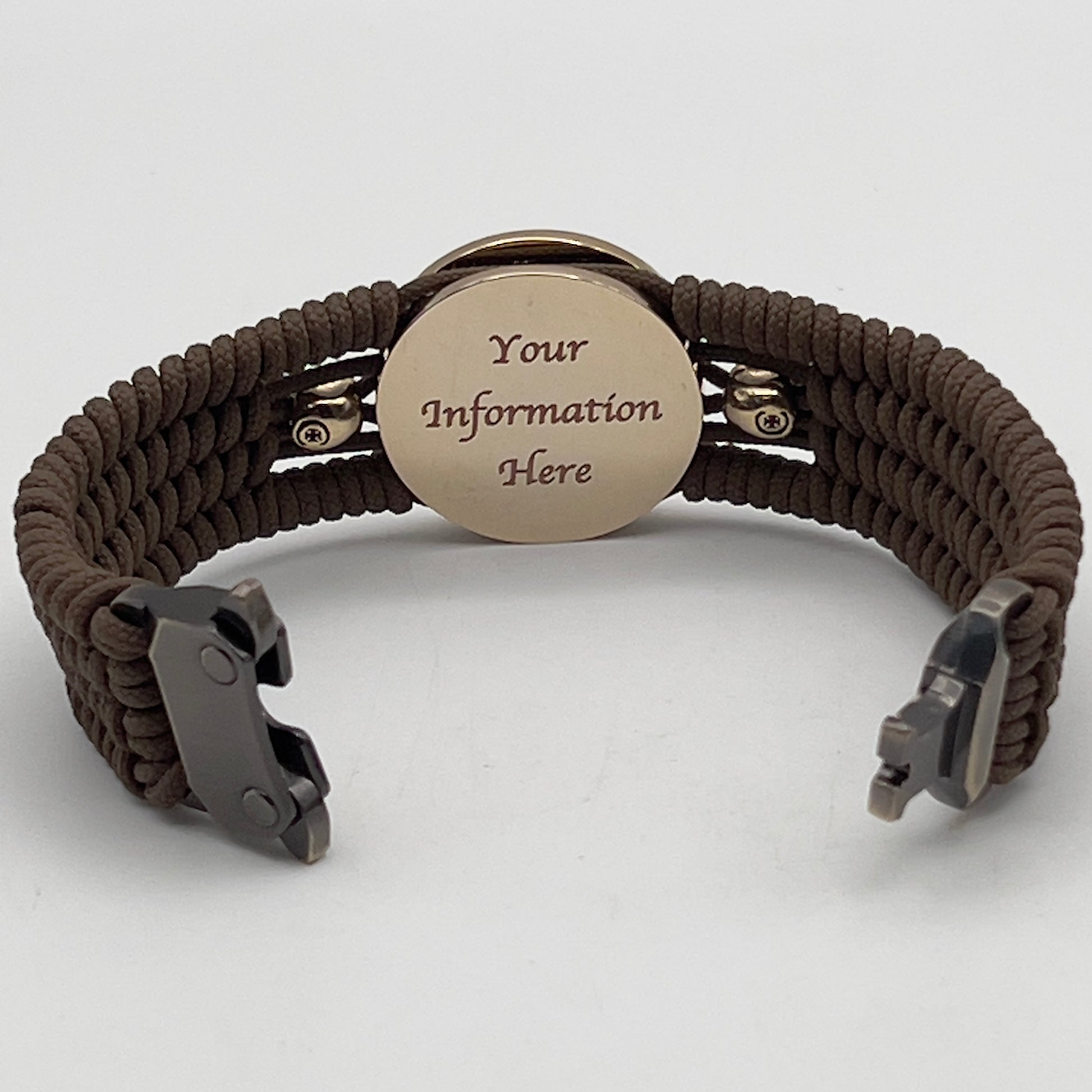 Thin, medium width, flexible and comfortable braided United States Marine Corps bracelet featuring a 24K gold and silver plated USMC officer Eagle Globe and Anchor medallion, two gold micro skulls, a gold Cobra style tactical buckle and woven with Coyote Brown type-1 paracord.