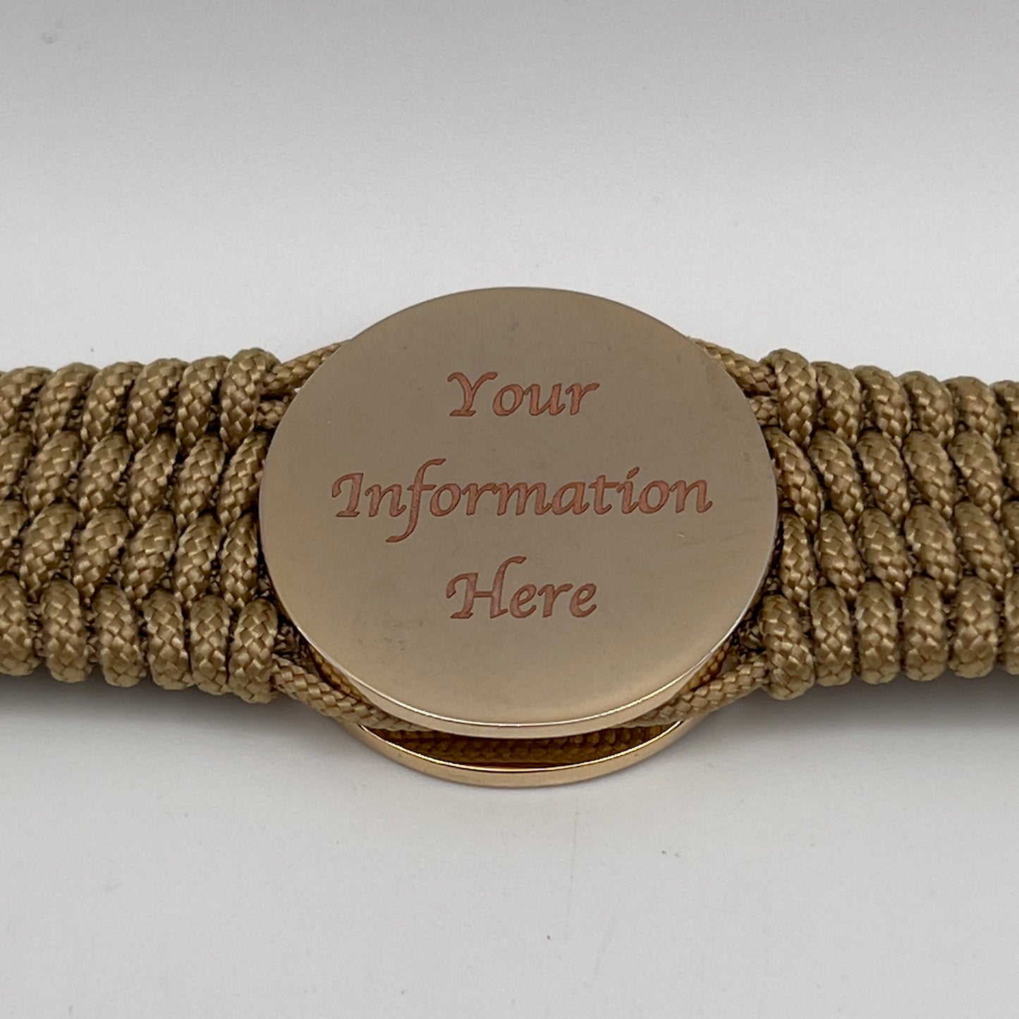 Thin, wide, flexible and comfortable braided United States Marine Corps bracelet featuring a 24K gold and silver plated USMC Eagle Globe and Anchor medallion, a gold Cobra style tactical buckle and woven with gold type-1 paracord.