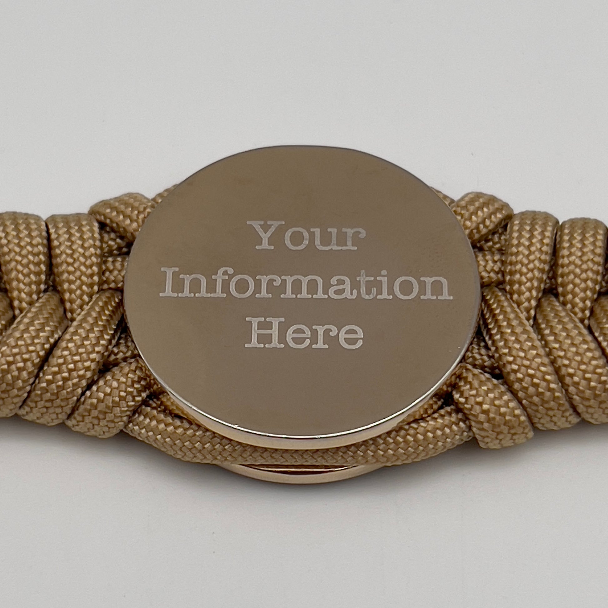 Thick and comfortable braided United States Marine Corps bracelet featuring a 24K gold and silver plated USMC officer Eagle Globe and Anchor medallion, a Cobra style tactical buckle and woven with gold 550 and Imperial red micro paracord.