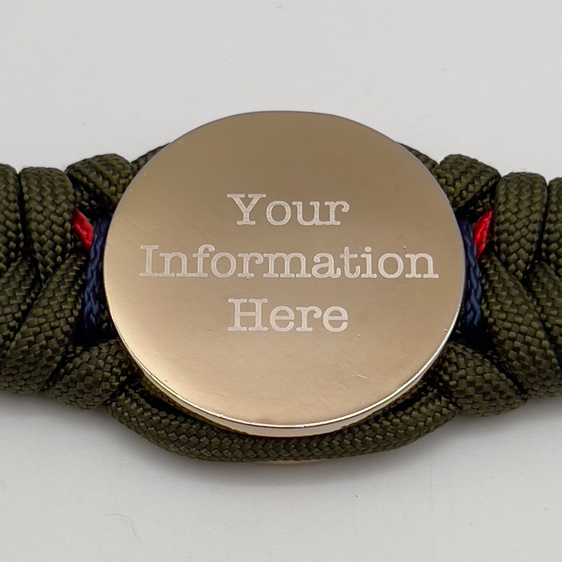Thick, semi-rigid and comfortable braided United States Marine Corps bracelet featuring a 24K gold and silver plated USMC officer Eagle Globe and Anchor medallion, a gold Cobra style tactical buckle and woven with olive drab 550 and Imperial red and gold micro paracord.