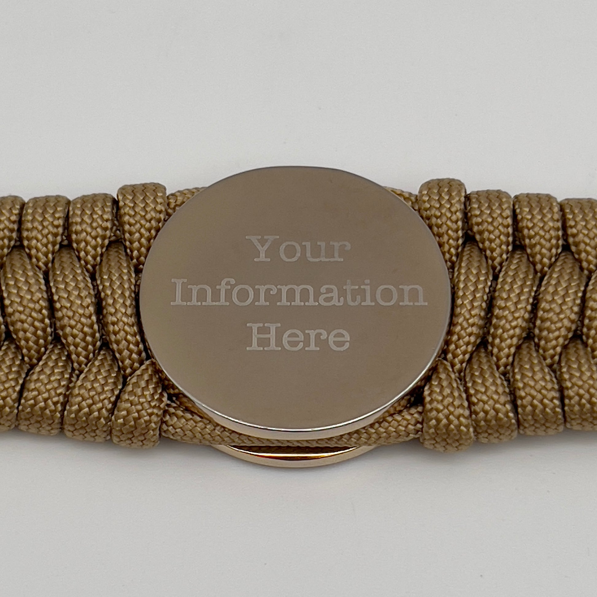 Thick and comfortable braided United States Marine Corps bracelet featuring a 24K gold and silver plated USMC officer Eagle Globe and Anchor medallion, a Cobra style tactical buckle and woven with gold 550 paracord.