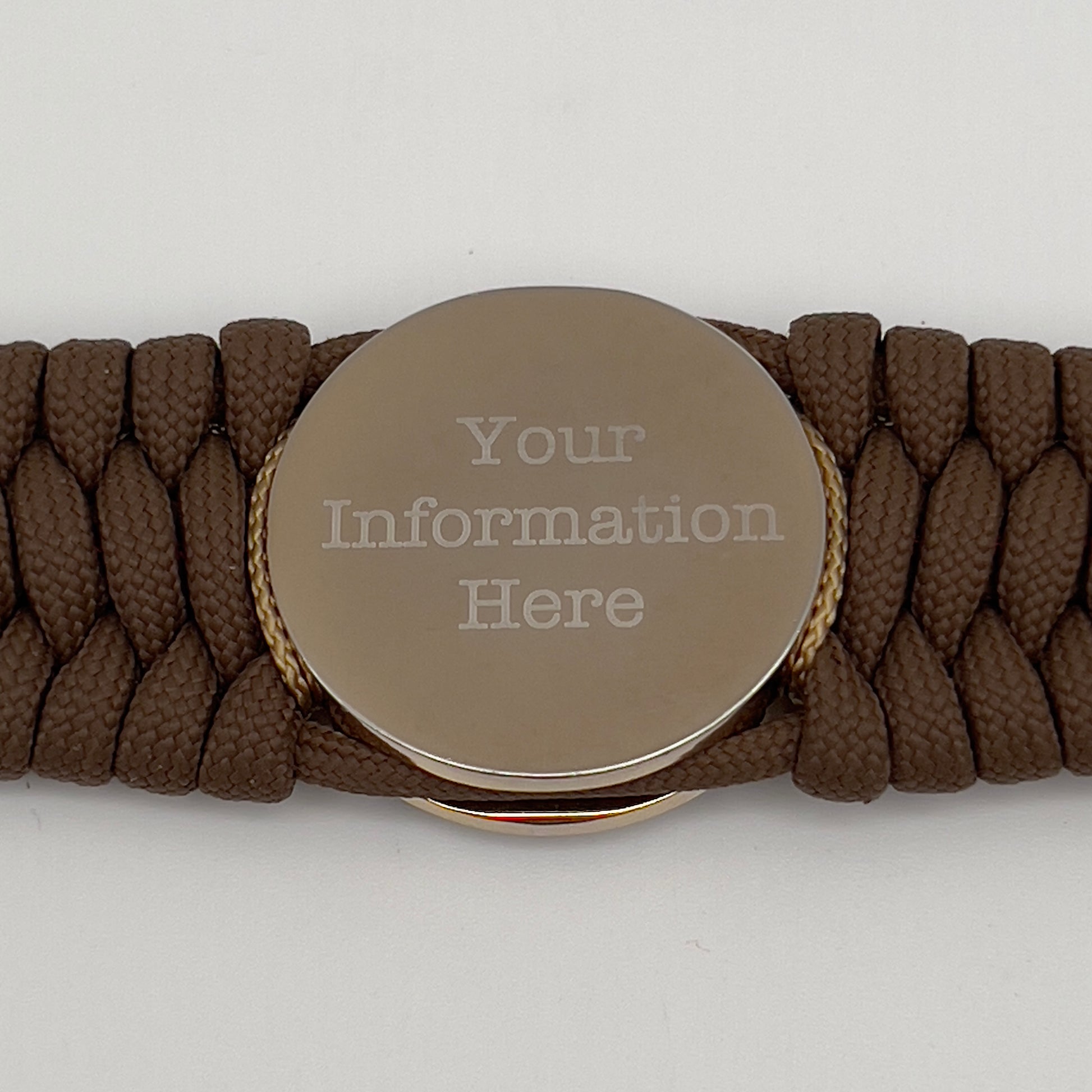 Thick and comfortable braided United States Marine Corps bracelet featuring a 24K gold and silver plated USMC officer Eagle Globe and Anchor medallion, a Cobra style tactical buckle and woven with Coyote Brown 550 paracord and Imperial Red and gold micro cord.