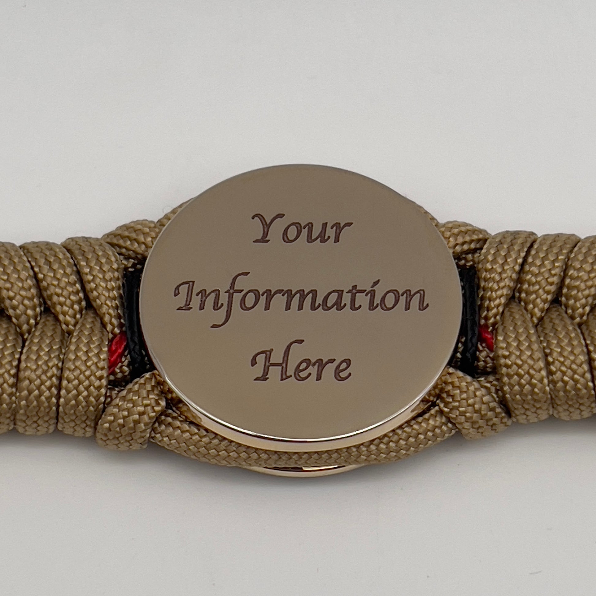 Thick, rigid and comfortable braided United States Marine Corps bracelet featuring a 24K gold plated USMC officer Eagle Globe and Anchor medallion, a gold Cobra style tactical buckle and woven with gold 550 paracord and Imperial Red and black micro cord.