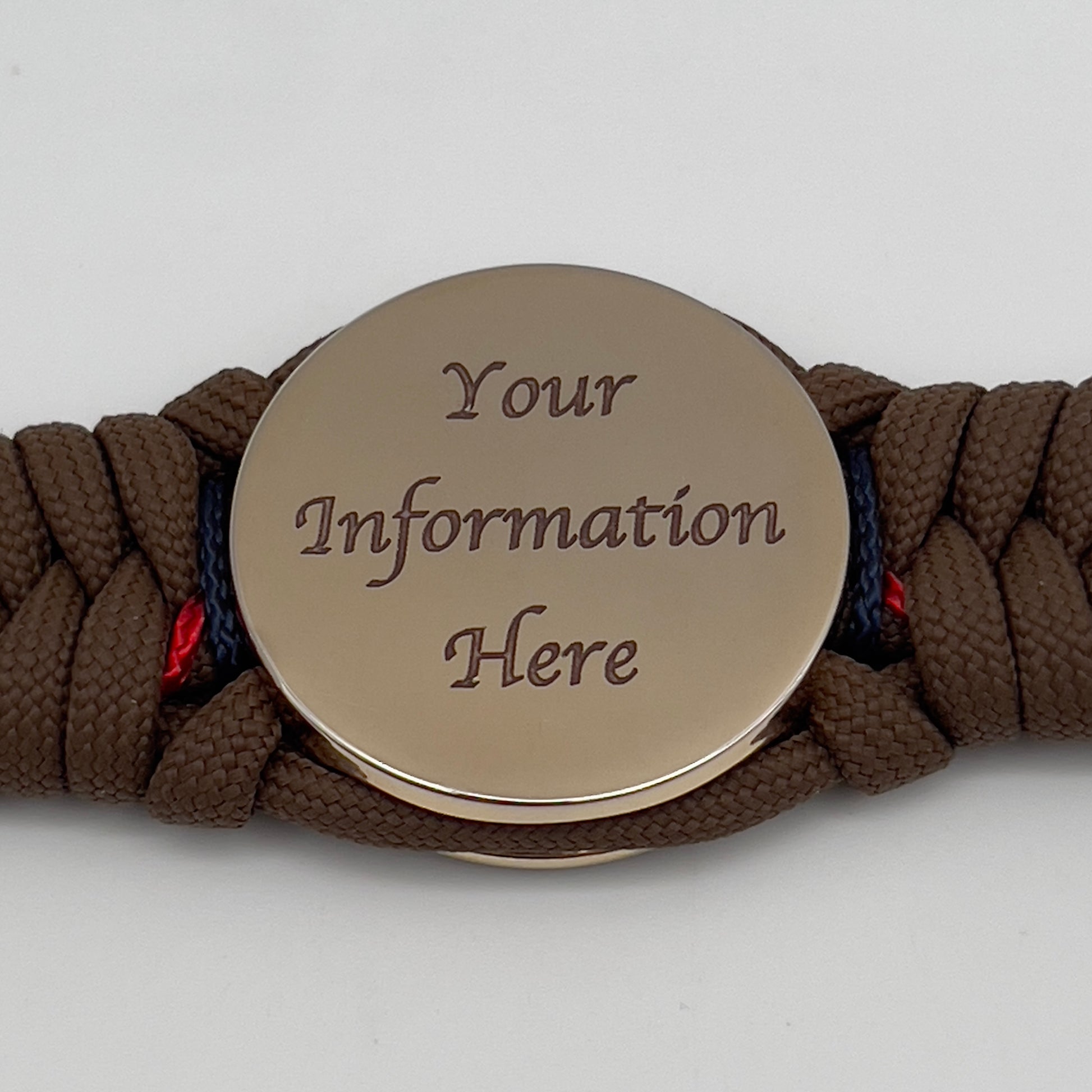 Thick, rigid and comfortable braided United States Marine Corps bracelet featuring a 24K gold plated USMC Eagle Globe and Anchor medallion, a gold Cobra style tactical buckle and woven with Coyote Brown 550 paracord and Imperial Red and Navy Blue micro cord.