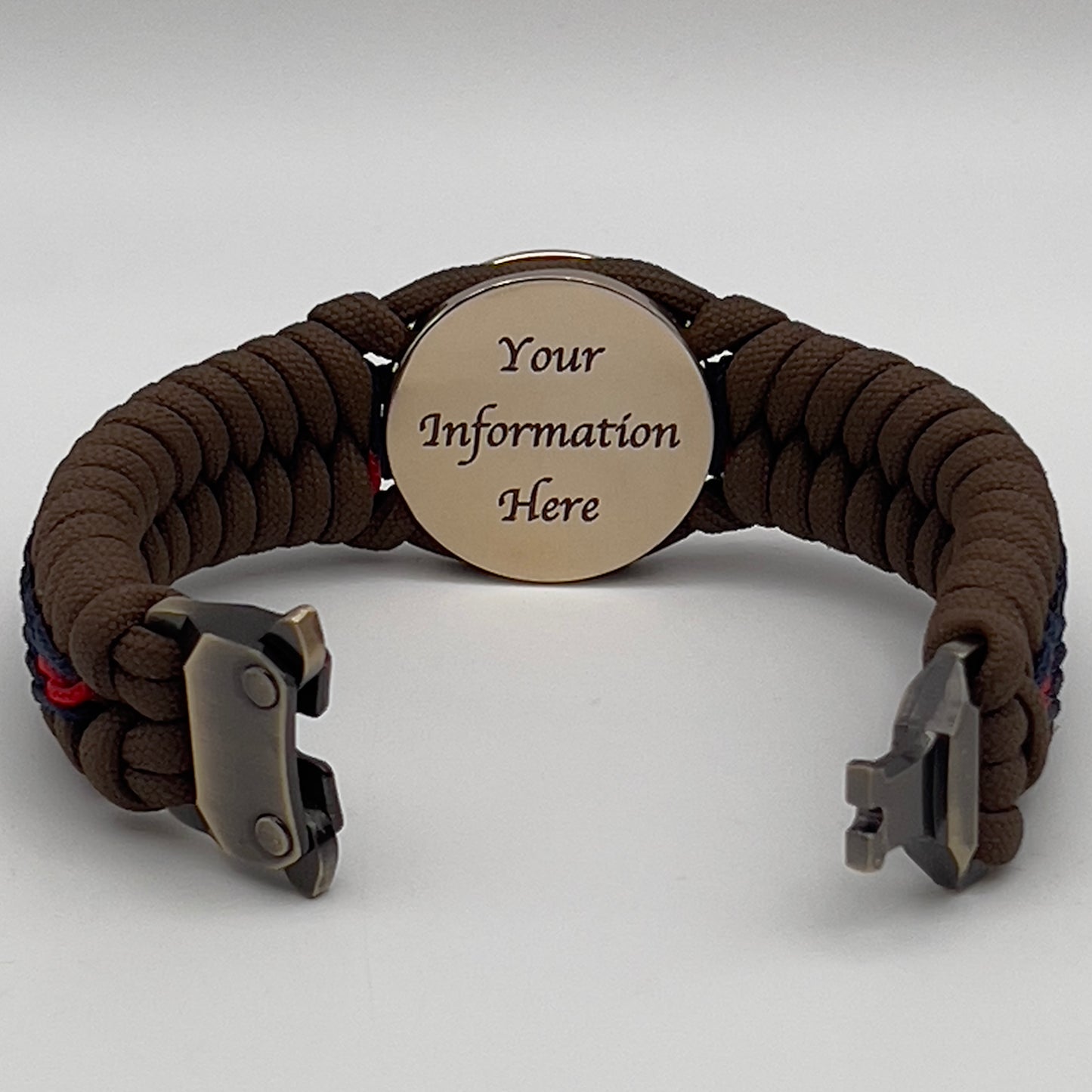 Thick, rigid and comfortable braided United States Marine Corps bracelet featuring a 24K gold plated USMC Eagle Globe and Anchor medallion, a gold Cobra style tactical buckle and woven with Coyote Brown 550 paracord and Imperial Red and Navy Blue micro cord.