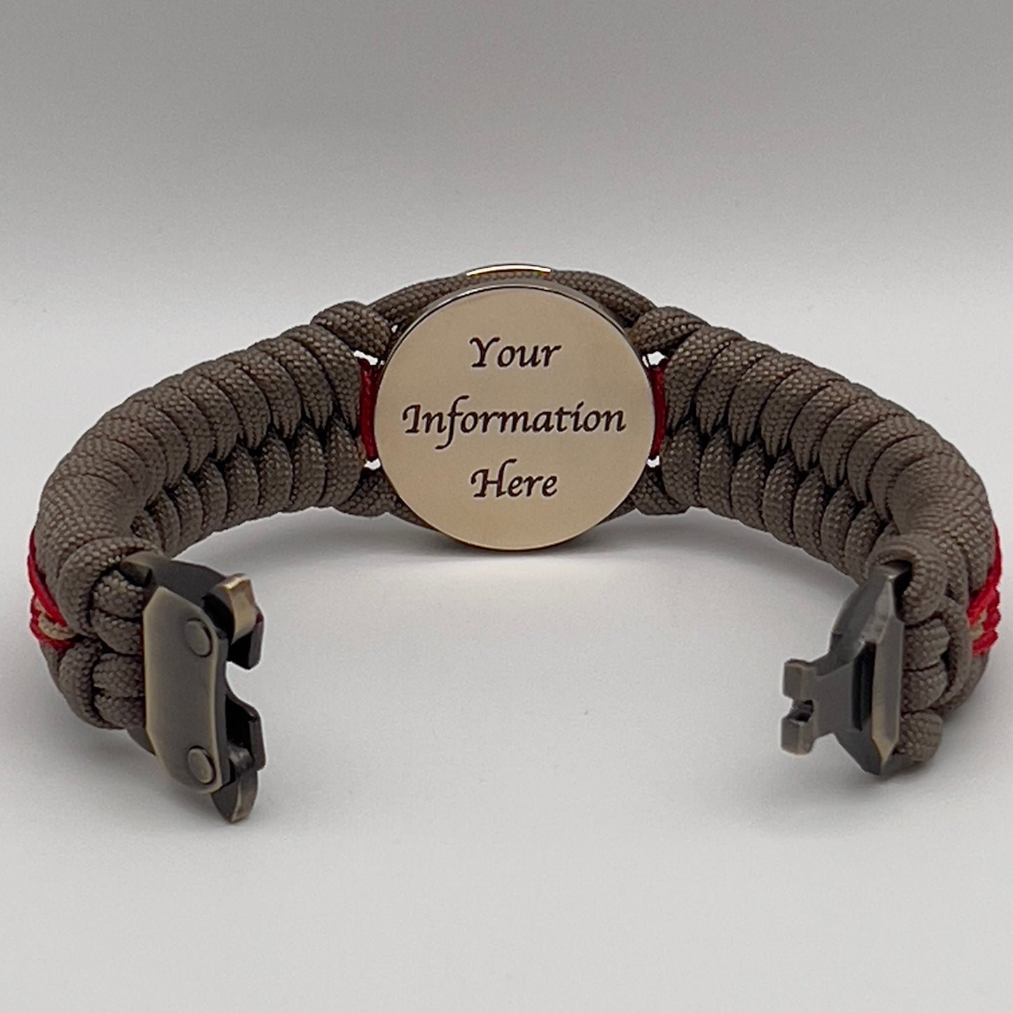 Thick, rigid and comfortable braided United States Marine Corps bracelet featuring a 24K gold plated USMC Eagle Globe and Anchor medallion, a gold Cobra style tactical buckle and woven with tan 550 paracord and Imperial Red and gold micro cord.