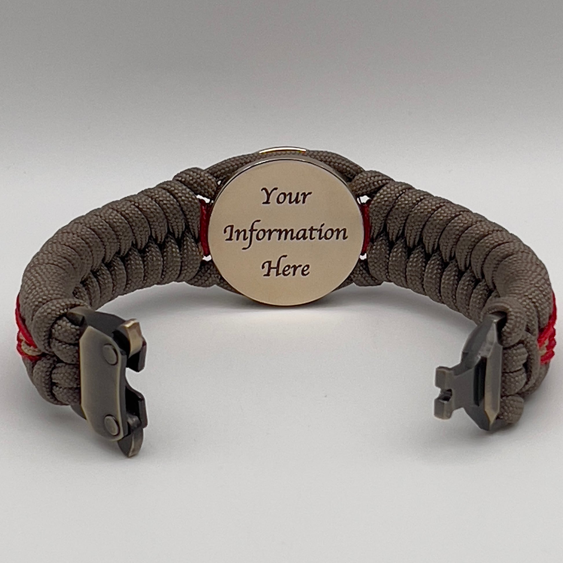 Thick, rigid and comfortable braided United States Marine Corps bracelet featuring a 24K gold plated USMC Eagle Globe and Anchor medallion, a gold Cobra style tactical buckle and woven with tan 550 paracord and Imperial Red and gold micro cord.