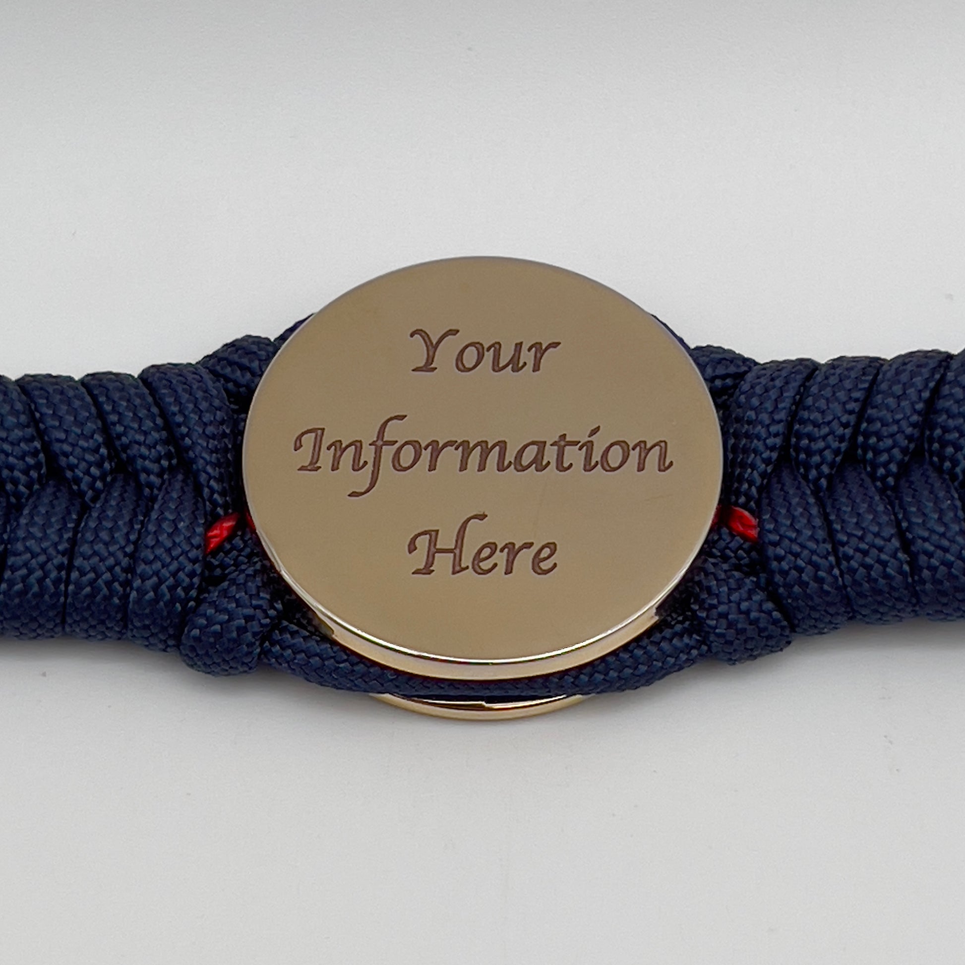 Thick, rigid and comfortable braided United States Marine Corps bracelet featuring a 24K gold plated USMC Eagle Globe and Anchor medallion, a gold Cobra style tactical buckle and woven withNavy Blue 550 paracord and Imperial Red micro cord.
