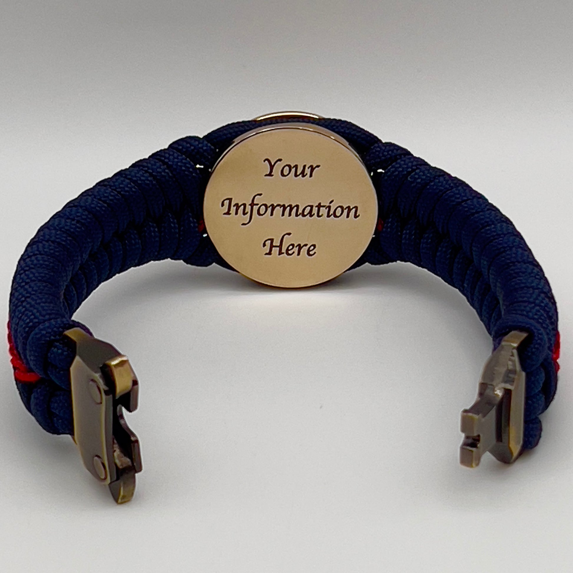 Thick, rigid and comfortable braided United States Marine Corps bracelet featuring a 24K gold plated USMC Eagle Globe and Anchor medallion, a gold Cobra style tactical buckle and woven withNavy Blue 550 paracord and Imperial Red micro cord.