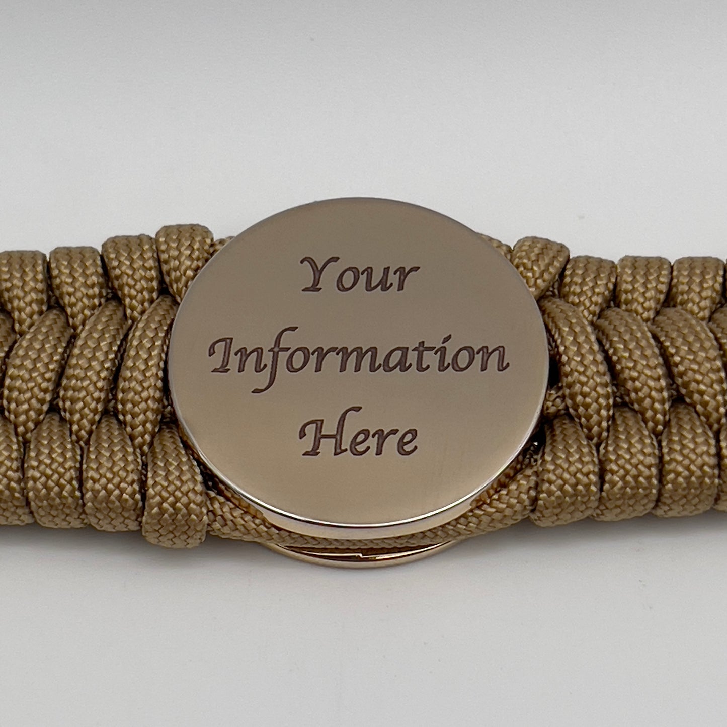 Thick, wide, rigid and comfortable braided United States Marine Corps bracelet featuring a 24K gold plated USMC Eagle Globe and Anchor medallion, a gold Cobra style tactical buckle and woven with gold 550 paracord.