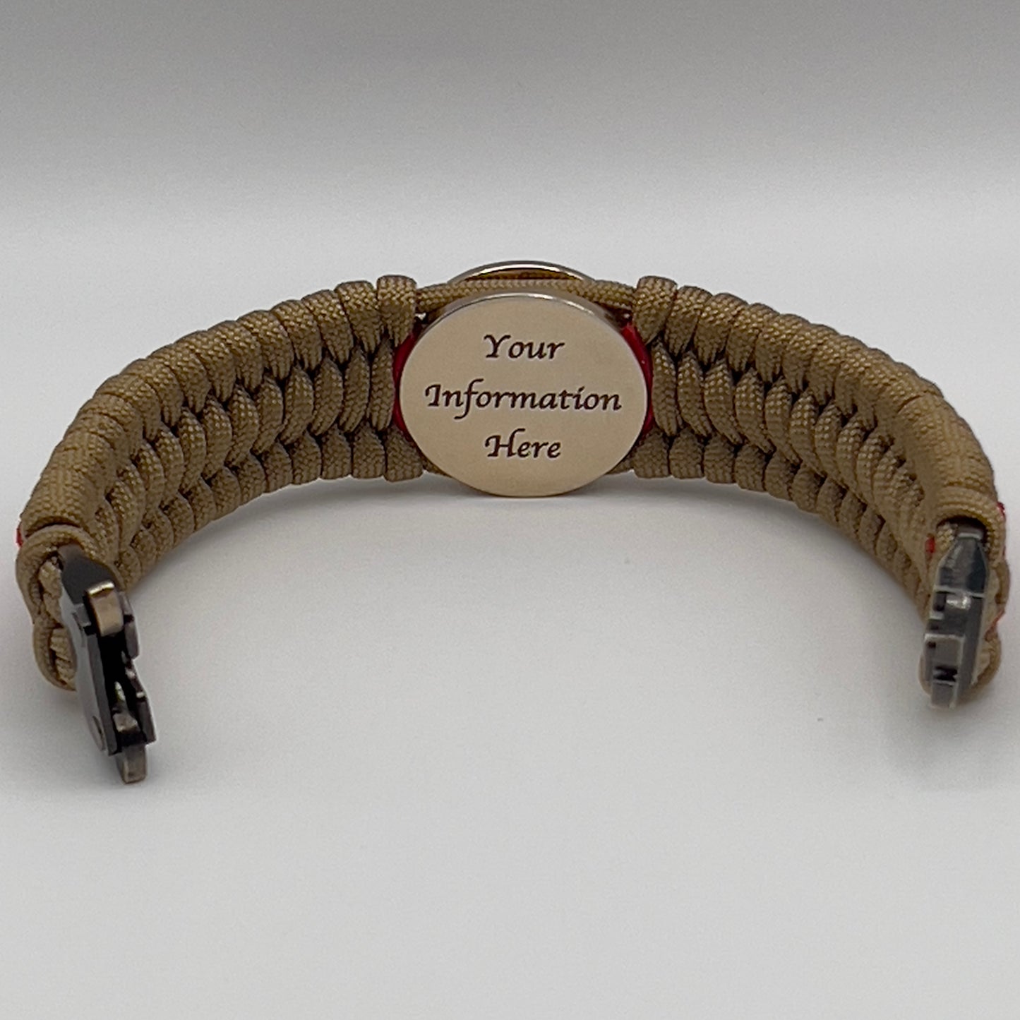 Thick, wide, rigid and comfortable braided United States Marine Corps bracelet featuring a 24K gold plated USMC Eagle Globe and Anchor medallion, a gold Cobra style tactical buckle and woven with gold 550 paracord and Imperial Red nano and micro cord.