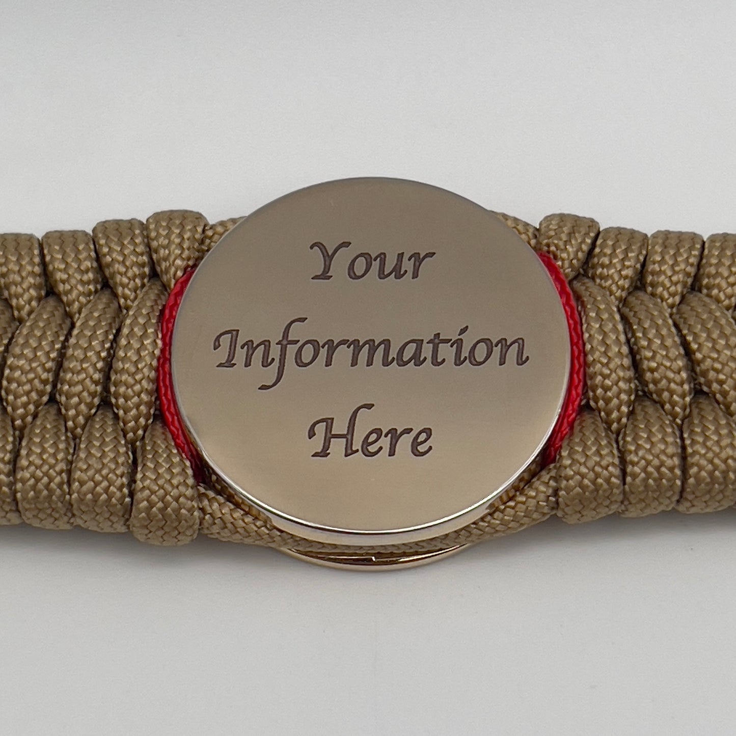 Thick, wide, rigid and comfortable braided United States Marine Corps bracelet featuring a 24K gold plated USMC Eagle Globe and Anchor medallion, a gold Cobra style tactical buckle and woven with gold 550 paracord and Imperial Red micro and black nano cord.