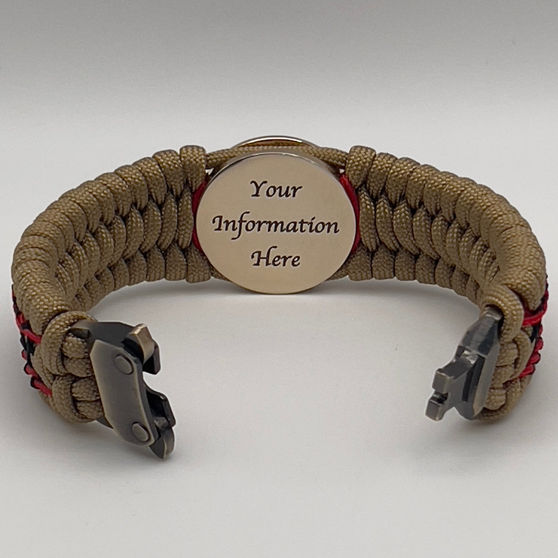 Thick, wide, rigid and comfortable braided United States Marine Corps bracelet featuring a 24K gold plated USMC Eagle Globe and Anchor medallion, a gold Cobra style tactical buckle and woven with gold 550 paracord and Imperial Red micro and black nano cord.