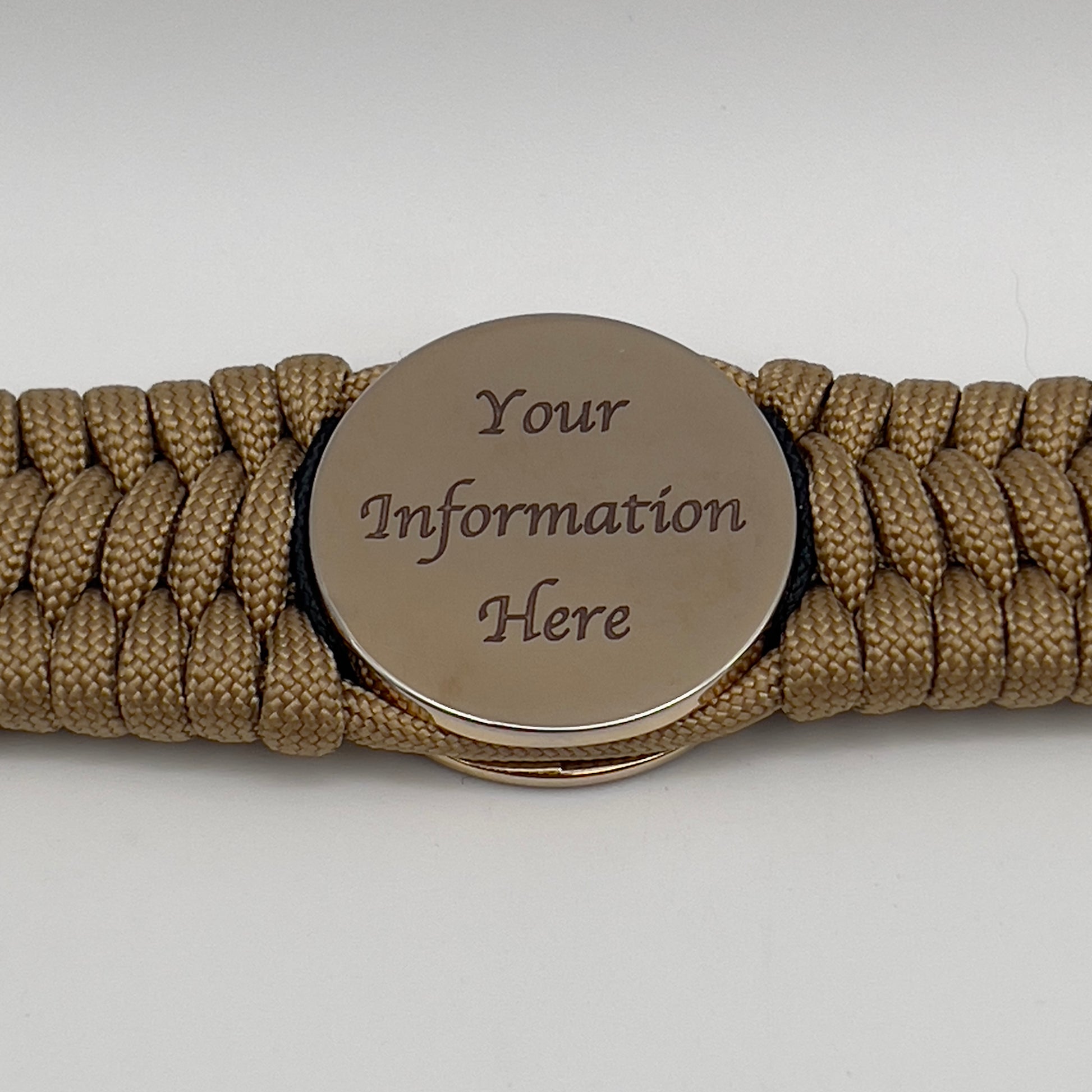 Thick, wide, rigid and comfortable braided United States Marine Corps bracelet featuring a 24K gold plated USMC Eagle Globe and Anchor medallion, a gold Cobra style tactical buckle and woven with gold 550 paracord and Imperial Red micro and black nano cord.