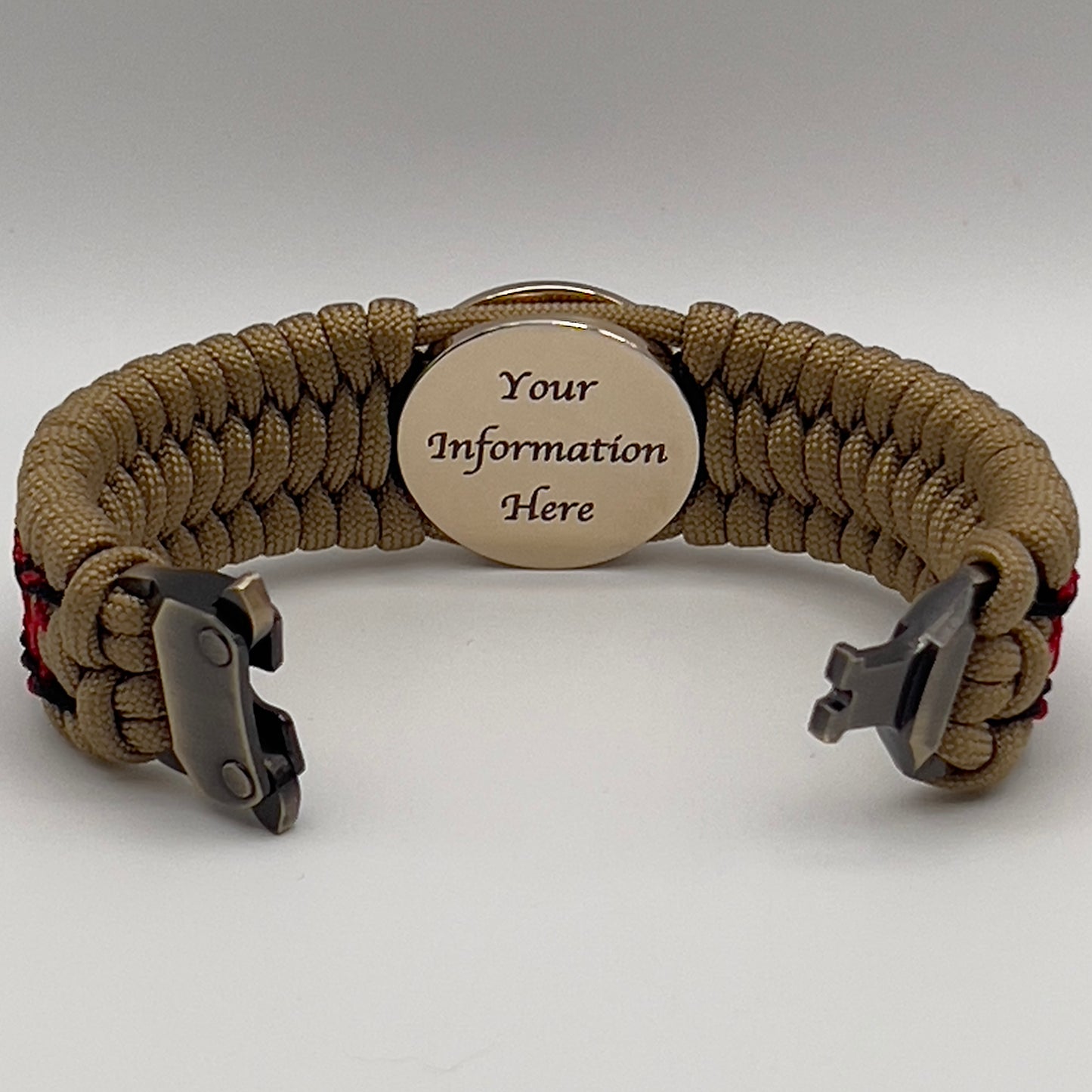 Thick, wide, rigid and comfortable braided United States Marine Corps bracelet featuring a 24K gold plated USMC Eagle Globe and Anchor medallion, a gold Cobra style tactical buckle and woven with gold 550 paracord and Imperial Red micro and black nano cord.