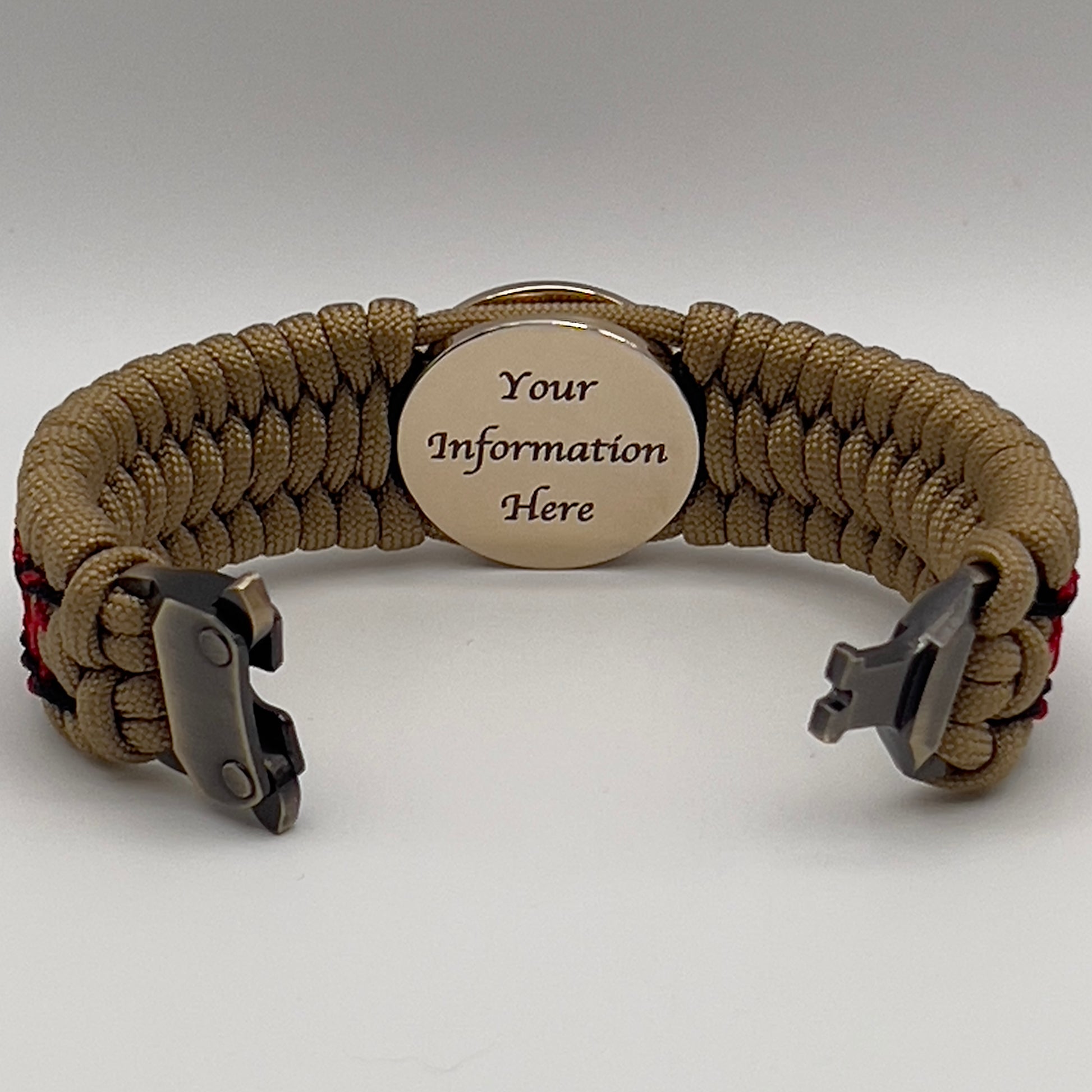 Thick, wide, rigid and comfortable braided United States Marine Corps bracelet featuring a 24K gold plated USMC Eagle Globe and Anchor medallion, a gold Cobra style tactical buckle and woven with gold 550 paracord and Imperial Red micro and black nano cord.