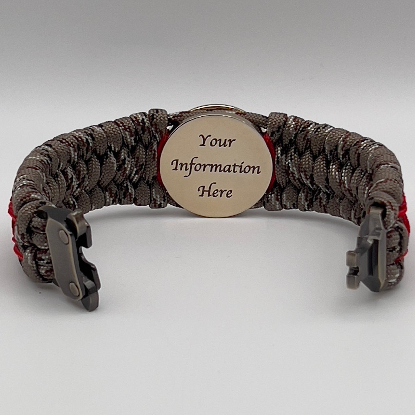 Thick, wide, rigid and comfortable braided United States Marine Corps bracelet featuring a 24K gold plated USMC Eagle Globe and Anchor medallion, a gold Cobra style tactical buckle and woven with Desert Camo 550 paracord and Imperial Red nano and micro cord.