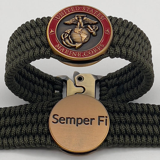 Thin, wide, very flexible and comfortable braided United States Marine Corps bracelet featuring a 24K antique gold plated USMC Eagle Globe and Anchor medallion, a gold Cobra style tactical buckle and woven with OIive Drab Type-1 paracord.