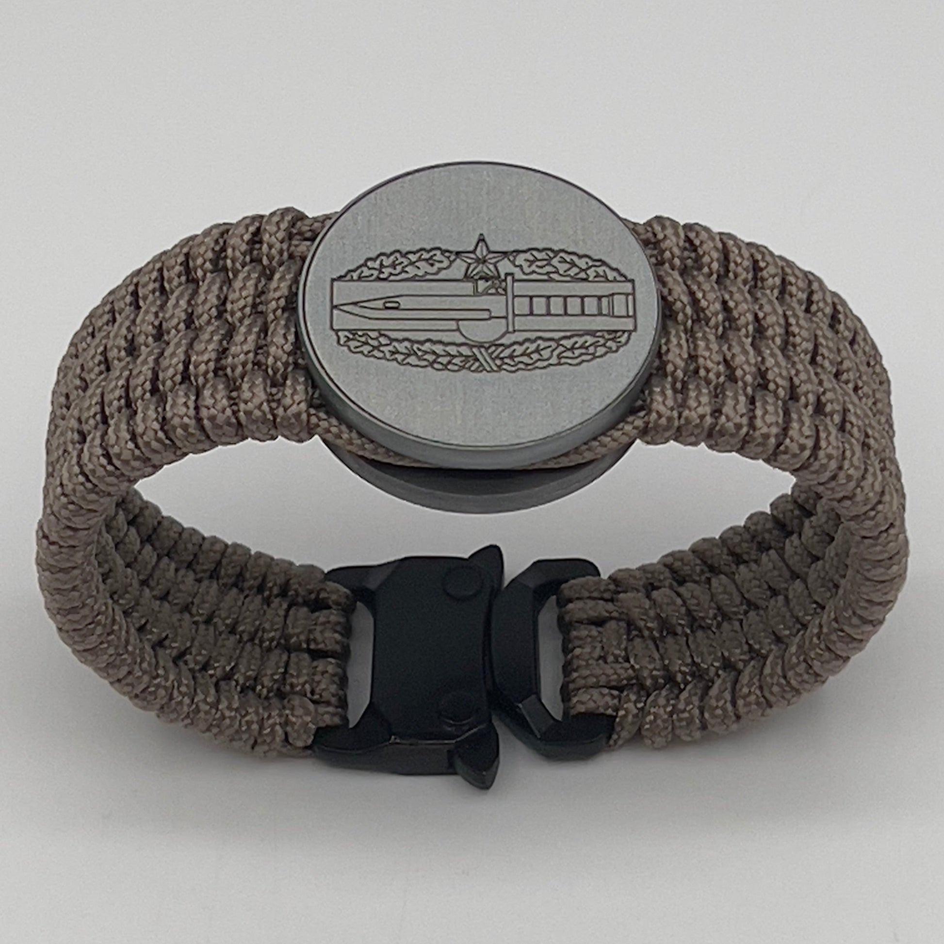 Tan US Army engraved Combat Action badge (2nd award) bracelet
