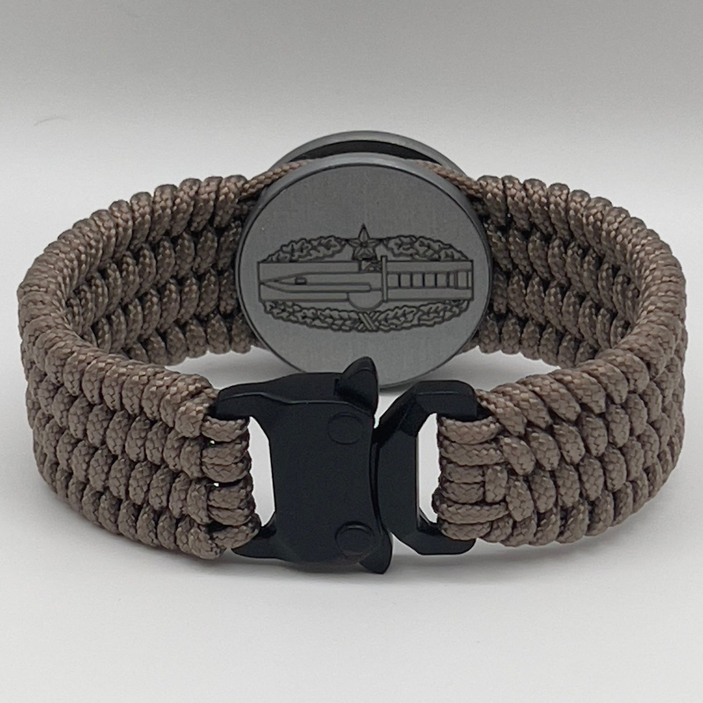 Tan US Army engraved Combat Action badge (2nd award) bracelet