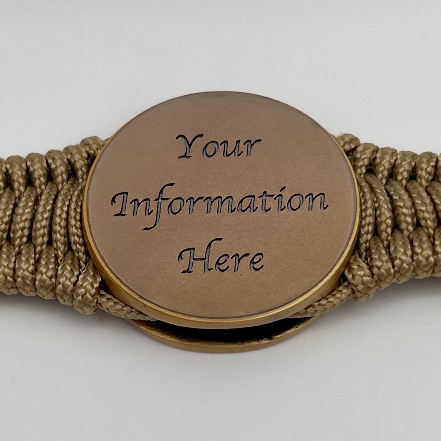 Thin, narrow, very thin and flexible and comfortable braided United States Marine Corps bracelet featuring a 24K antique gold plated USMC Eagle Globe and Anchor medallion, a gold Cobra style tactical buckle and woven with gold Type-1 paracord.