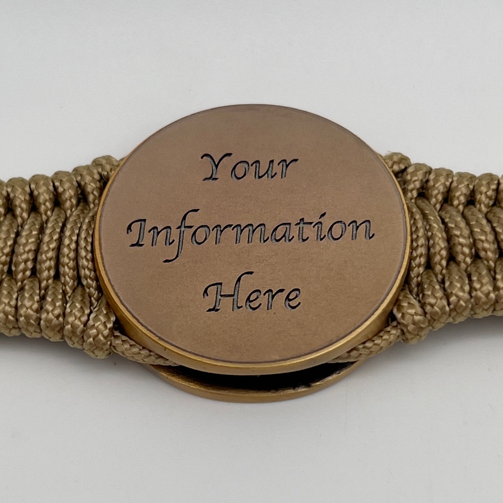 Thin, narrow, very thin and flexible and comfortable braided United States Marine Corps bracelet featuring a 24K antique gold plated USMC Eagle Globe and Anchor medallion, a gold Cobra style tactical buckle and woven with gold Type-1 paracord.