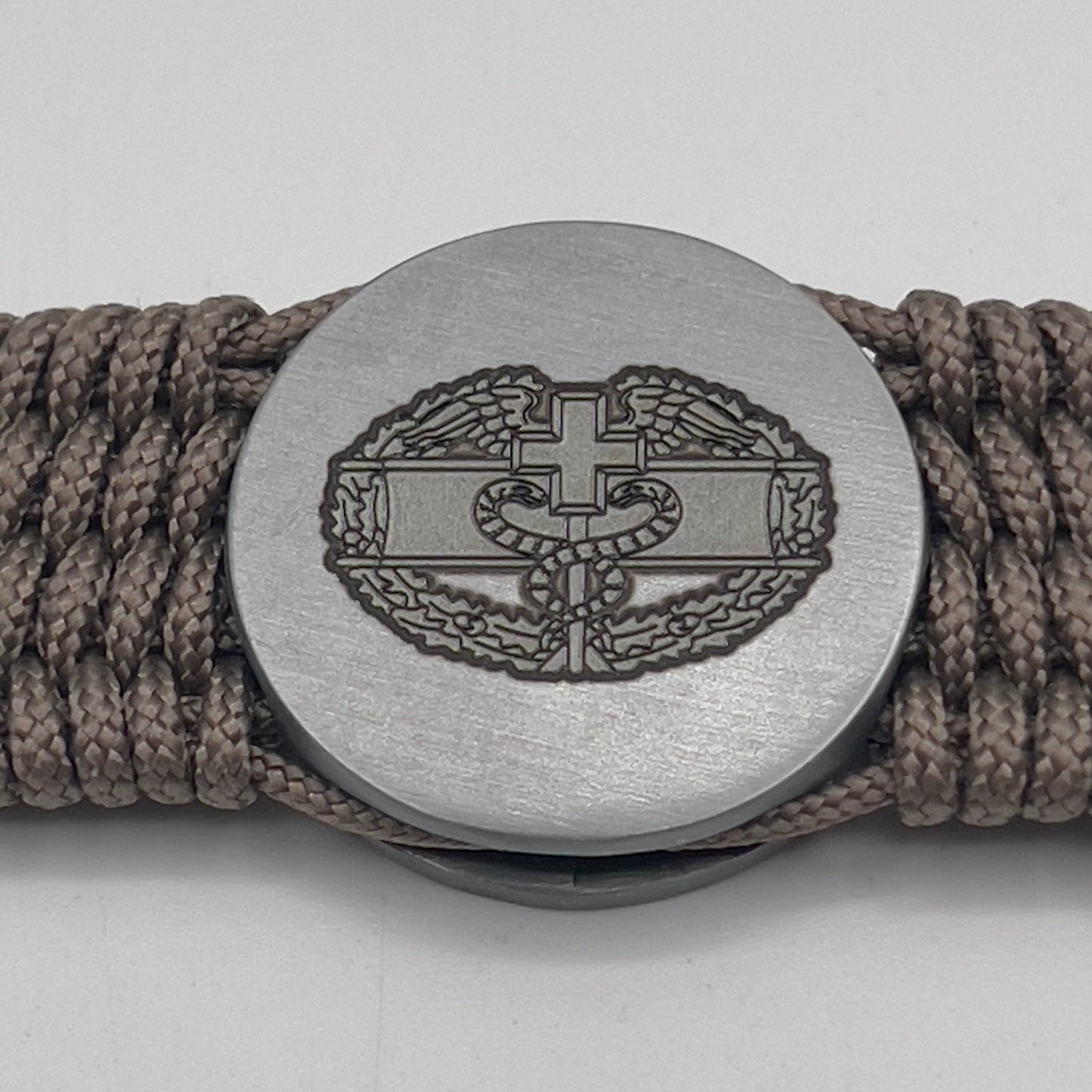 Tan US Army Combat Medic badge bracelet