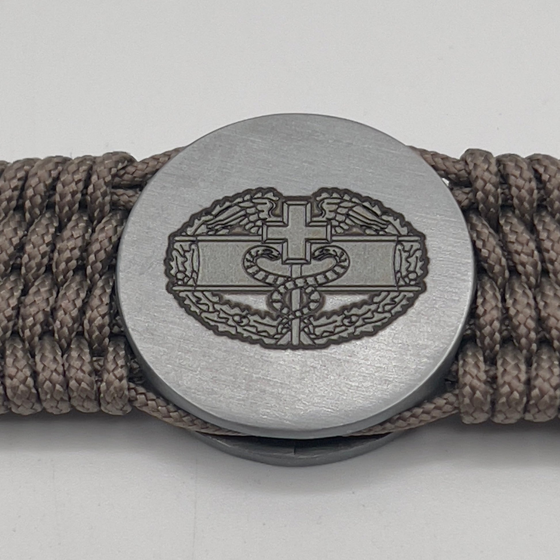 Tan US Army Combat Medic badge bracelet